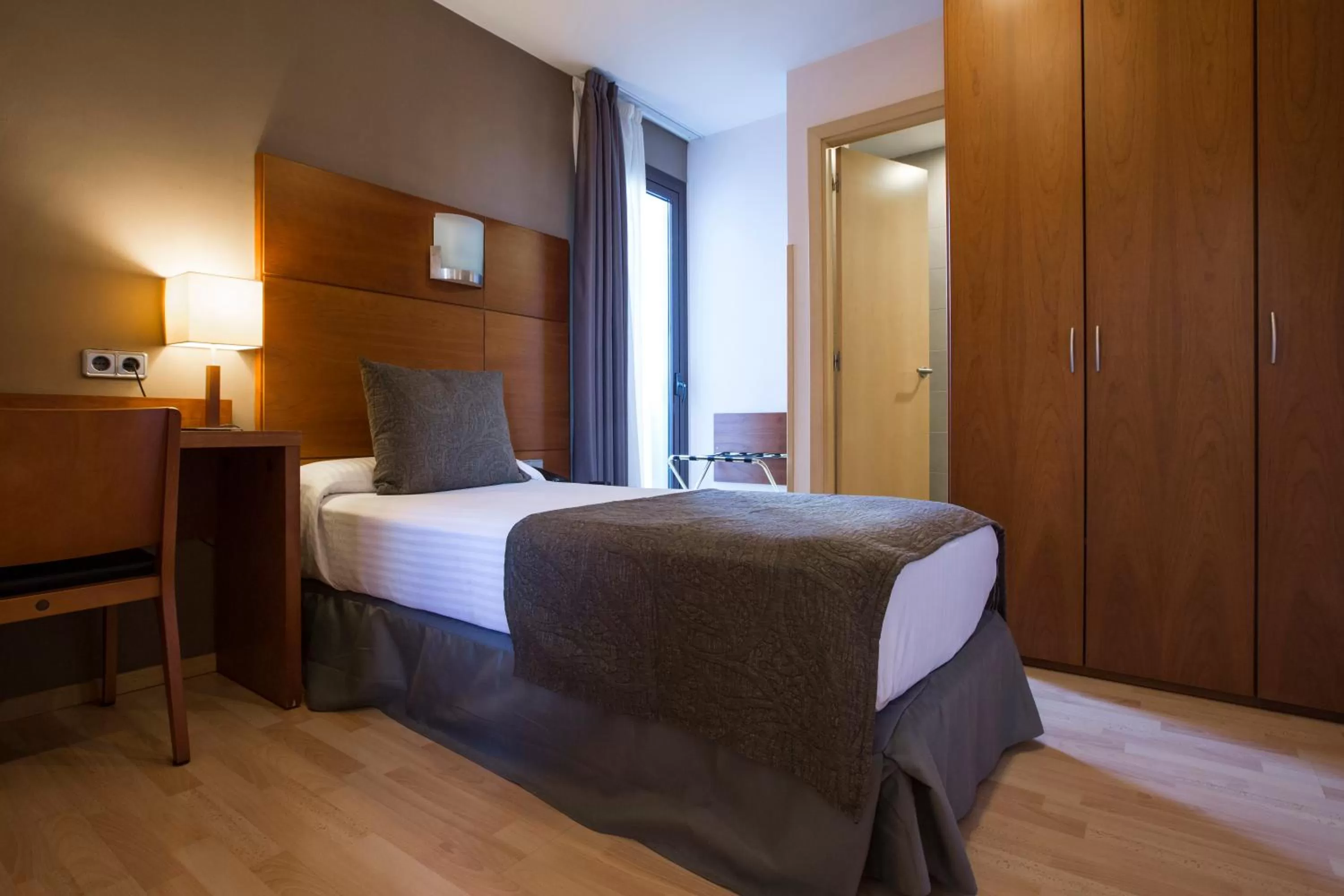 Bed in Hotel Via Augusta