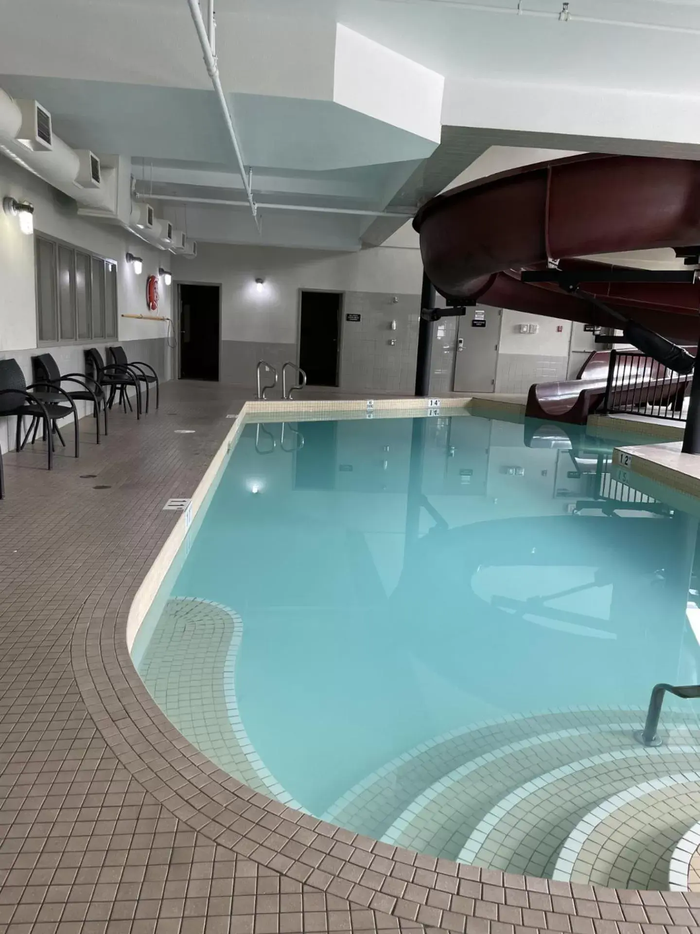 Swimming Pool in Ramada by Wyndham Airdrie Hotel & Suites