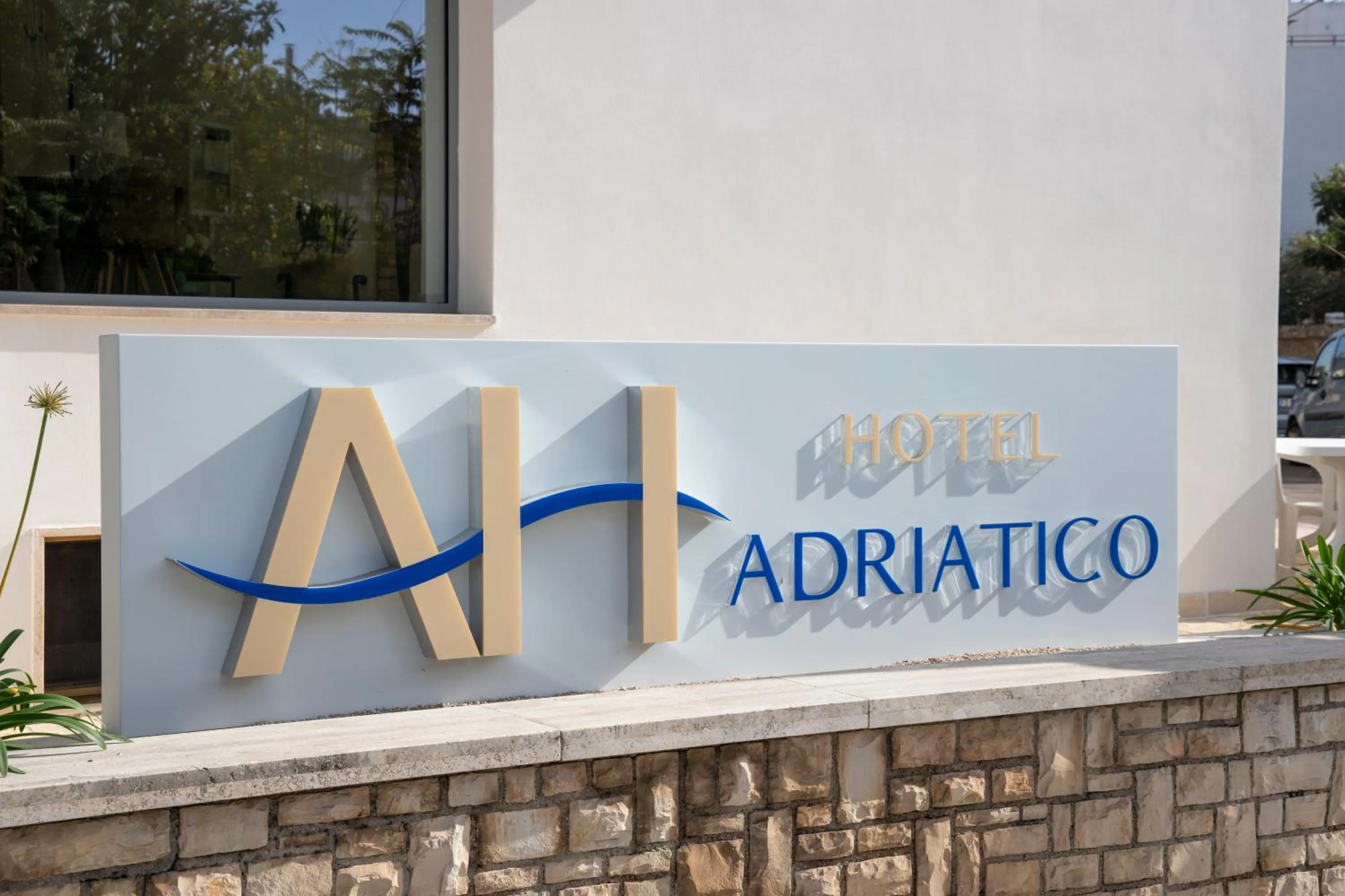 Property logo or sign in Hotel Adriatico