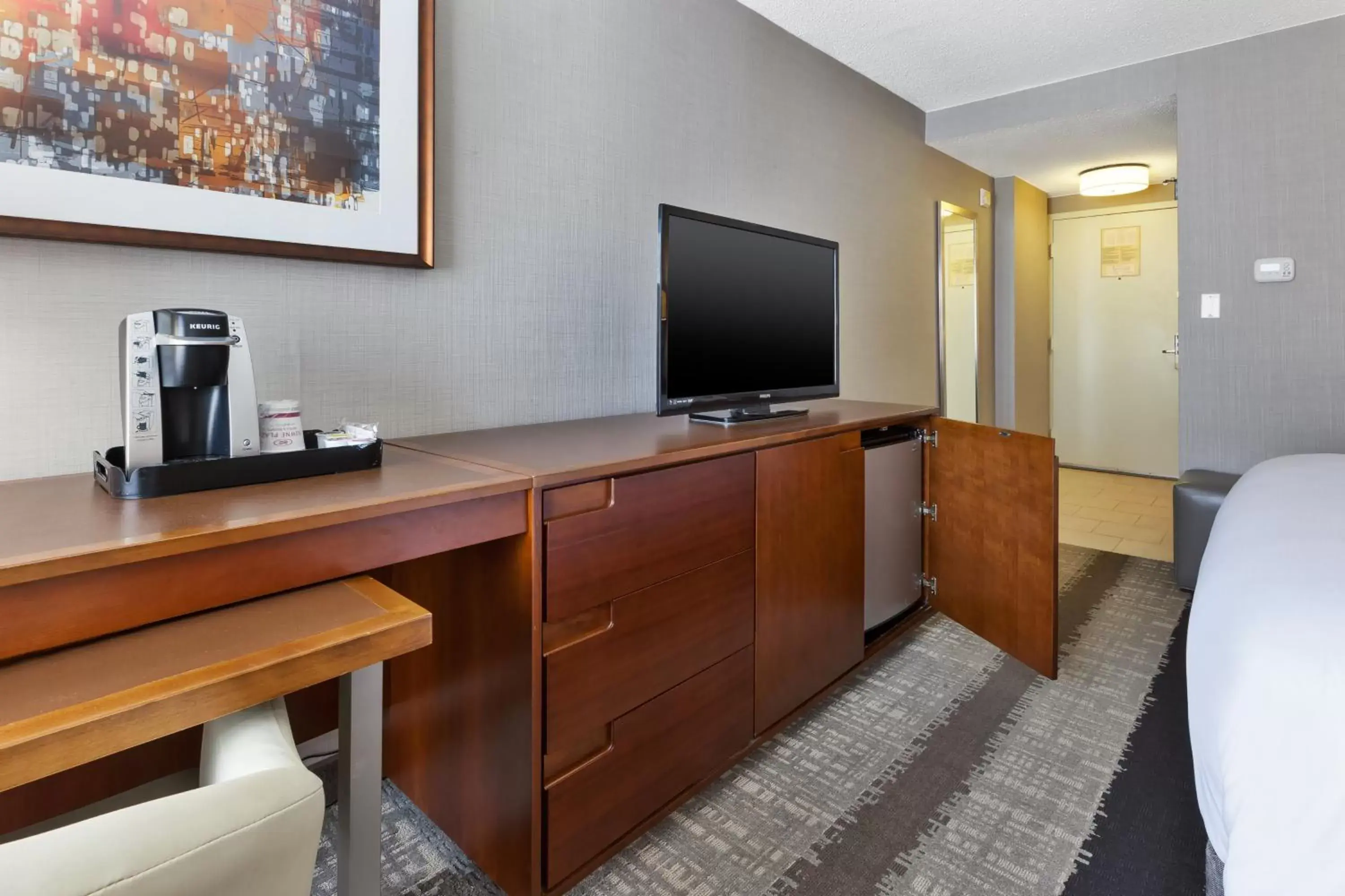 Photo of the whole room, TV/Entertainment Center in Crowne Plaza Dulles Airport, an IHG Hotel