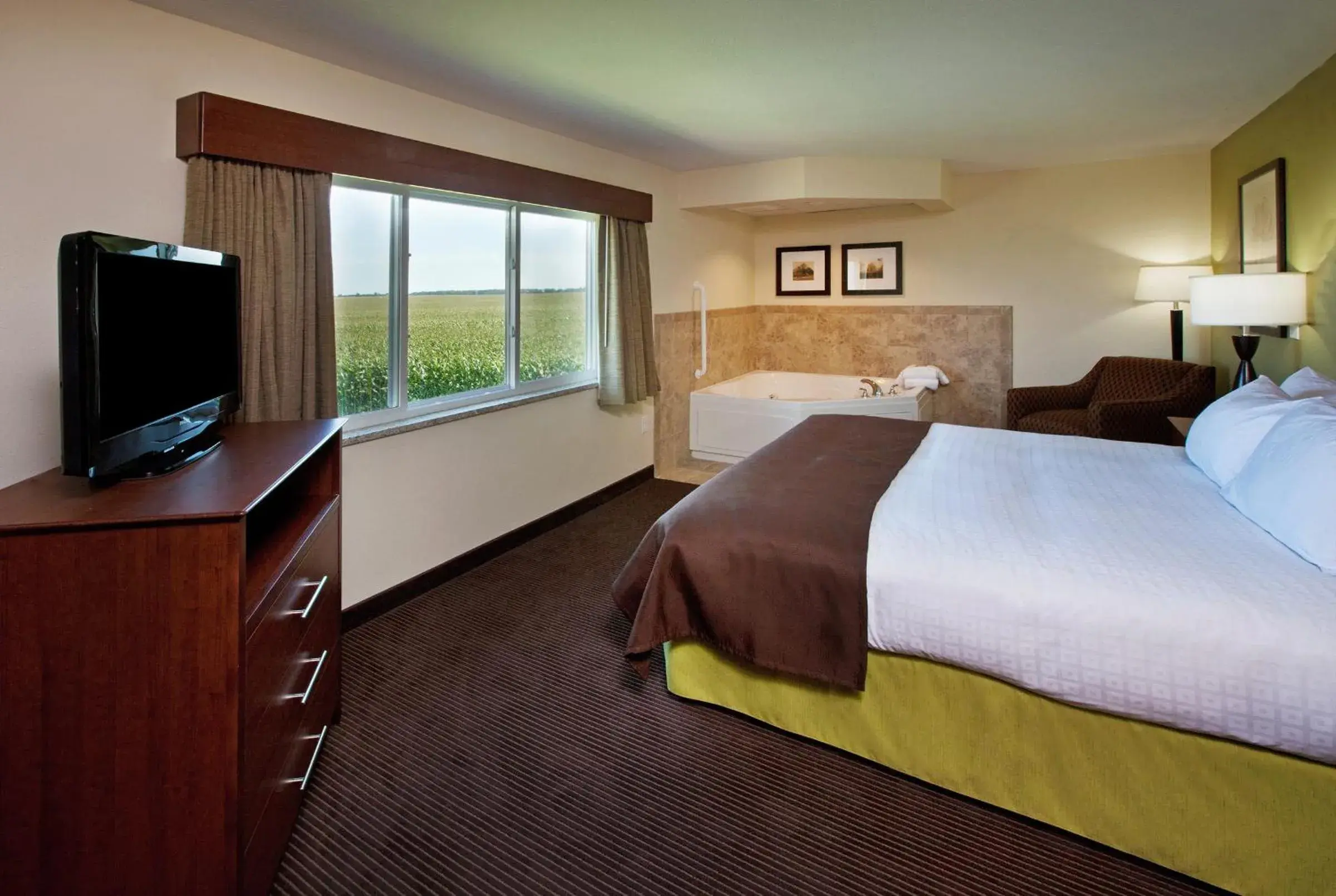 View (from property/room), Bed in AmericInn by Wyndham Osage