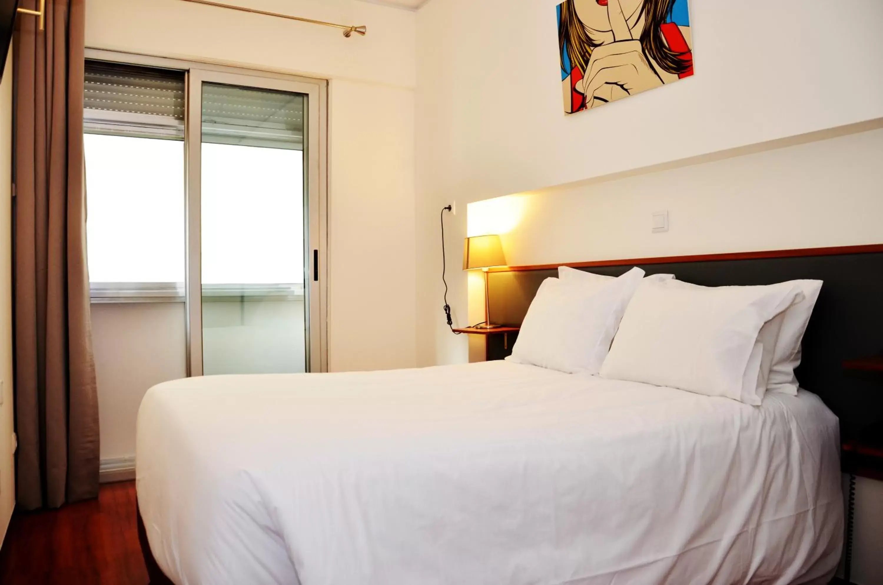 Bed in Hotel Girassol