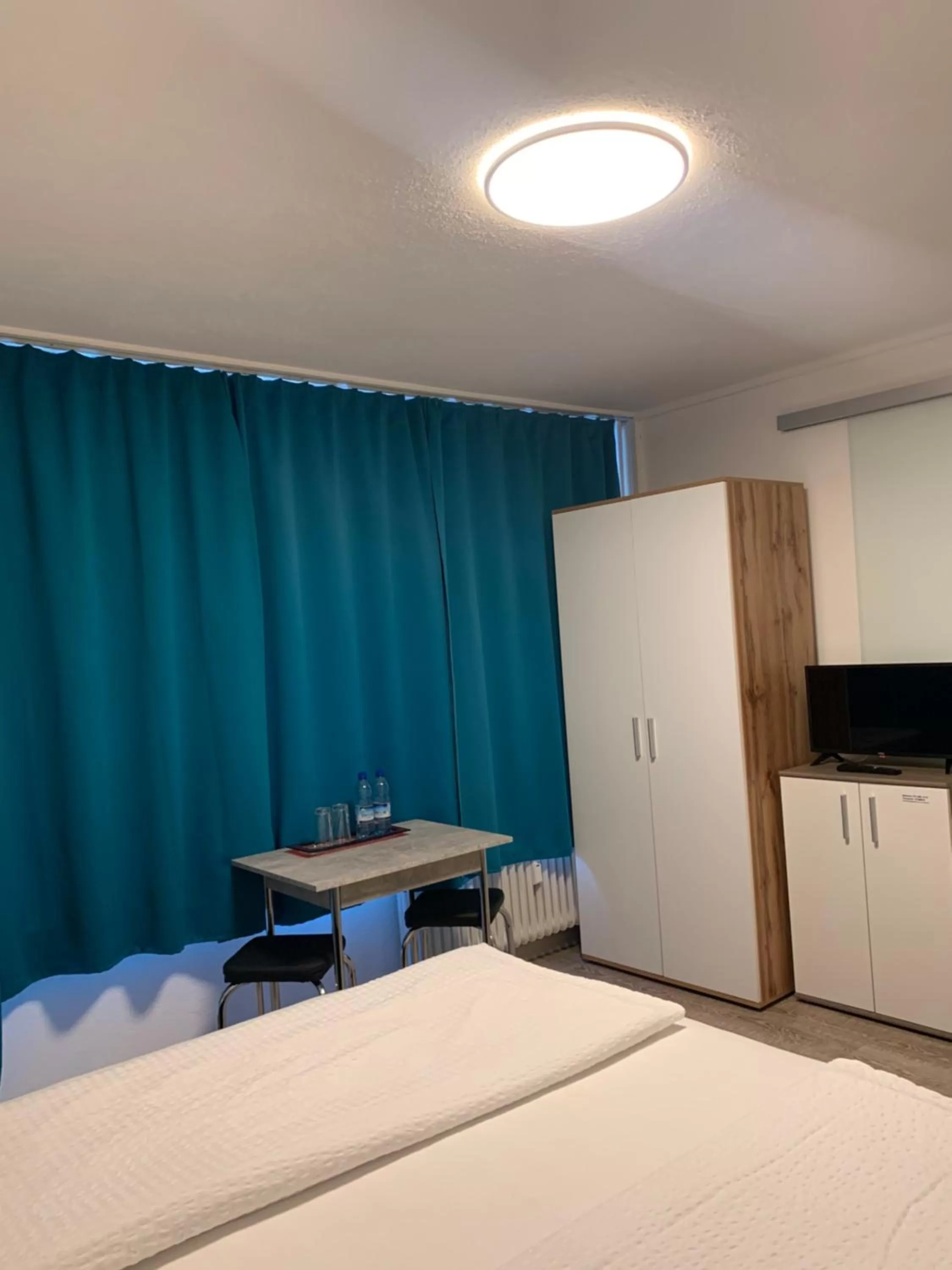 TV and multimedia, Bed in Smart Stay Rooms Feldkirch