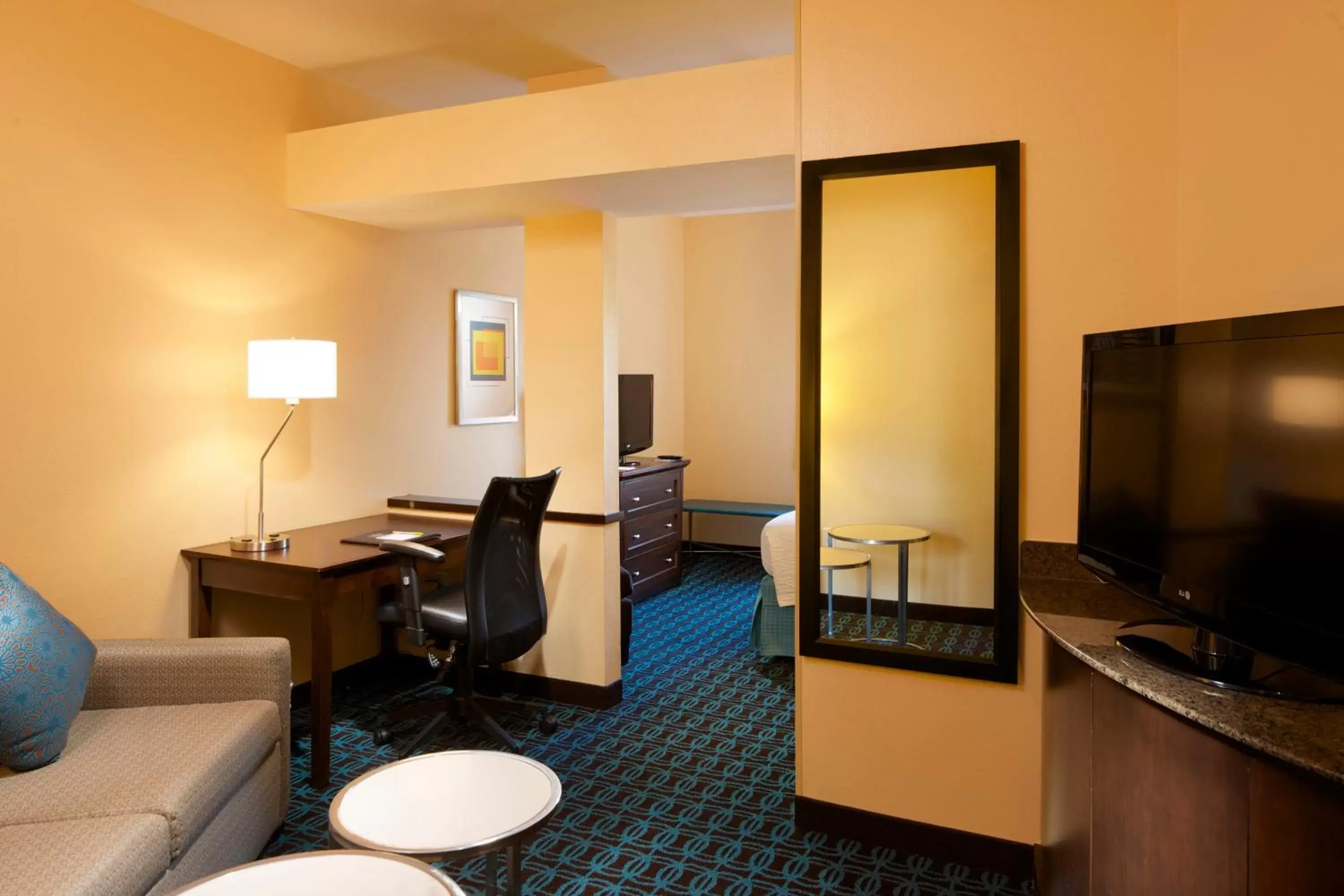 Photo of the whole room, TV/Entertainment Center in Fairfield Inn & Suites Houston Intercontinental Airport