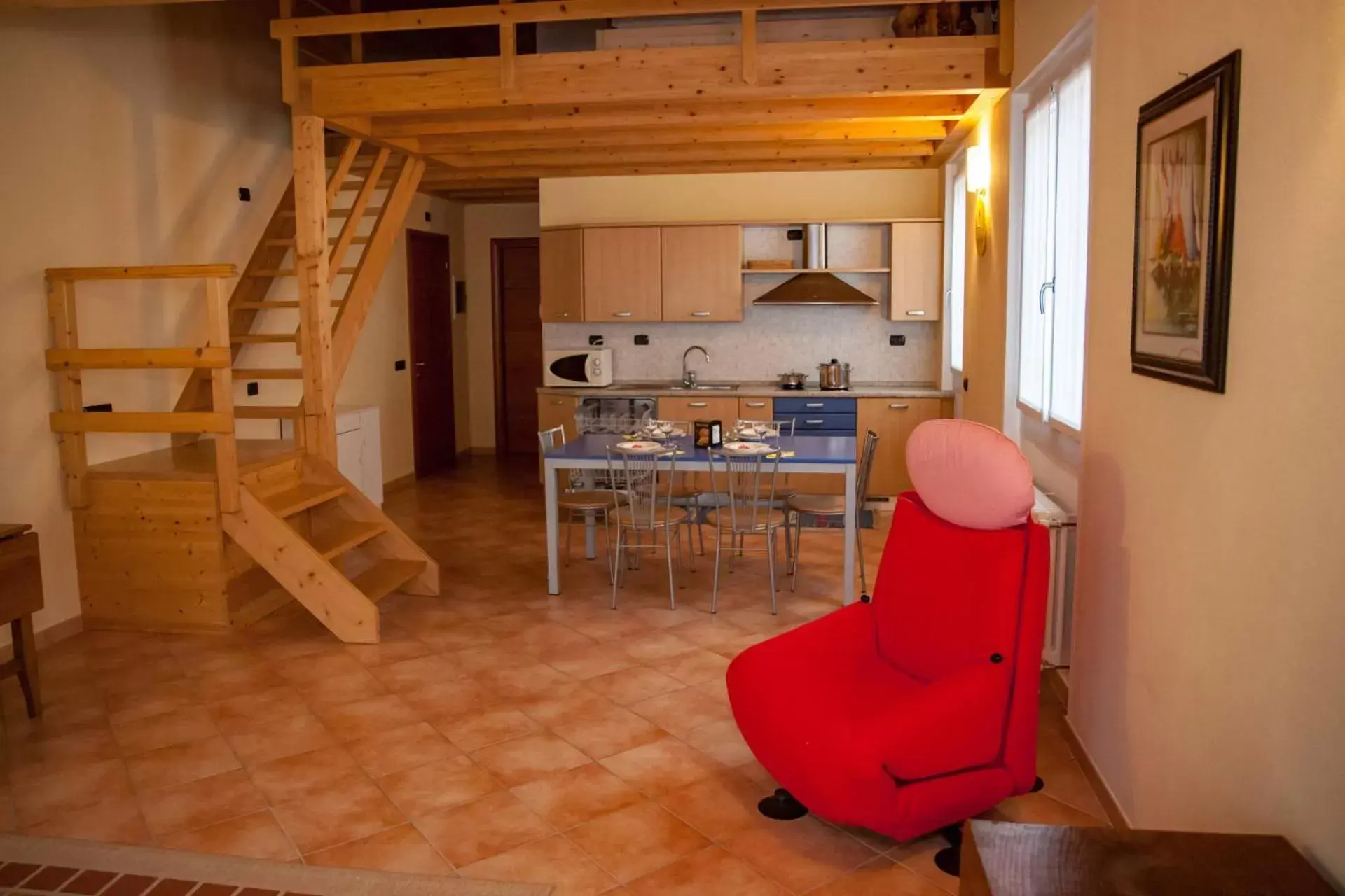 Living room, Kitchen/Kitchenette in Hotel Garni Le Corti