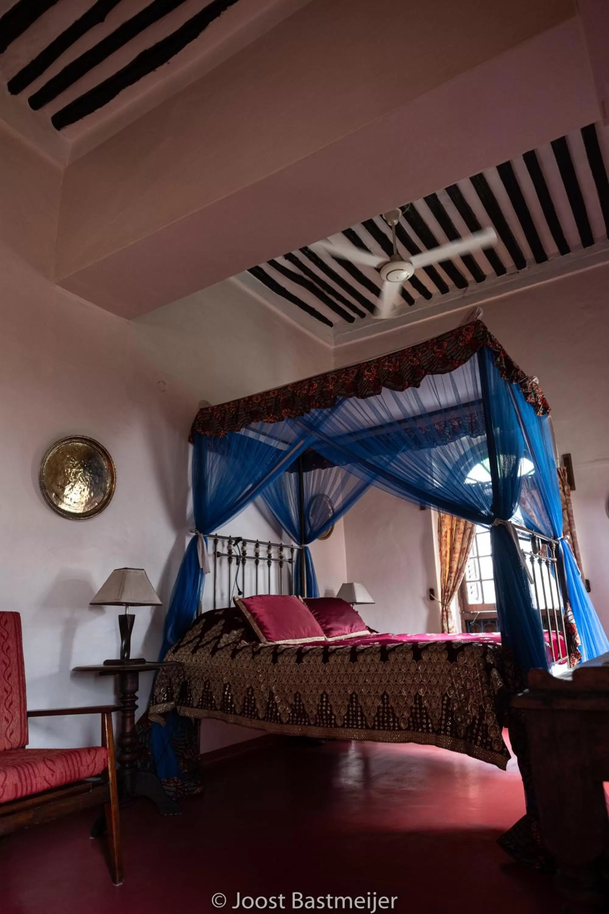 Photo of the whole room, Bed in Zanzibar Palace Hotel