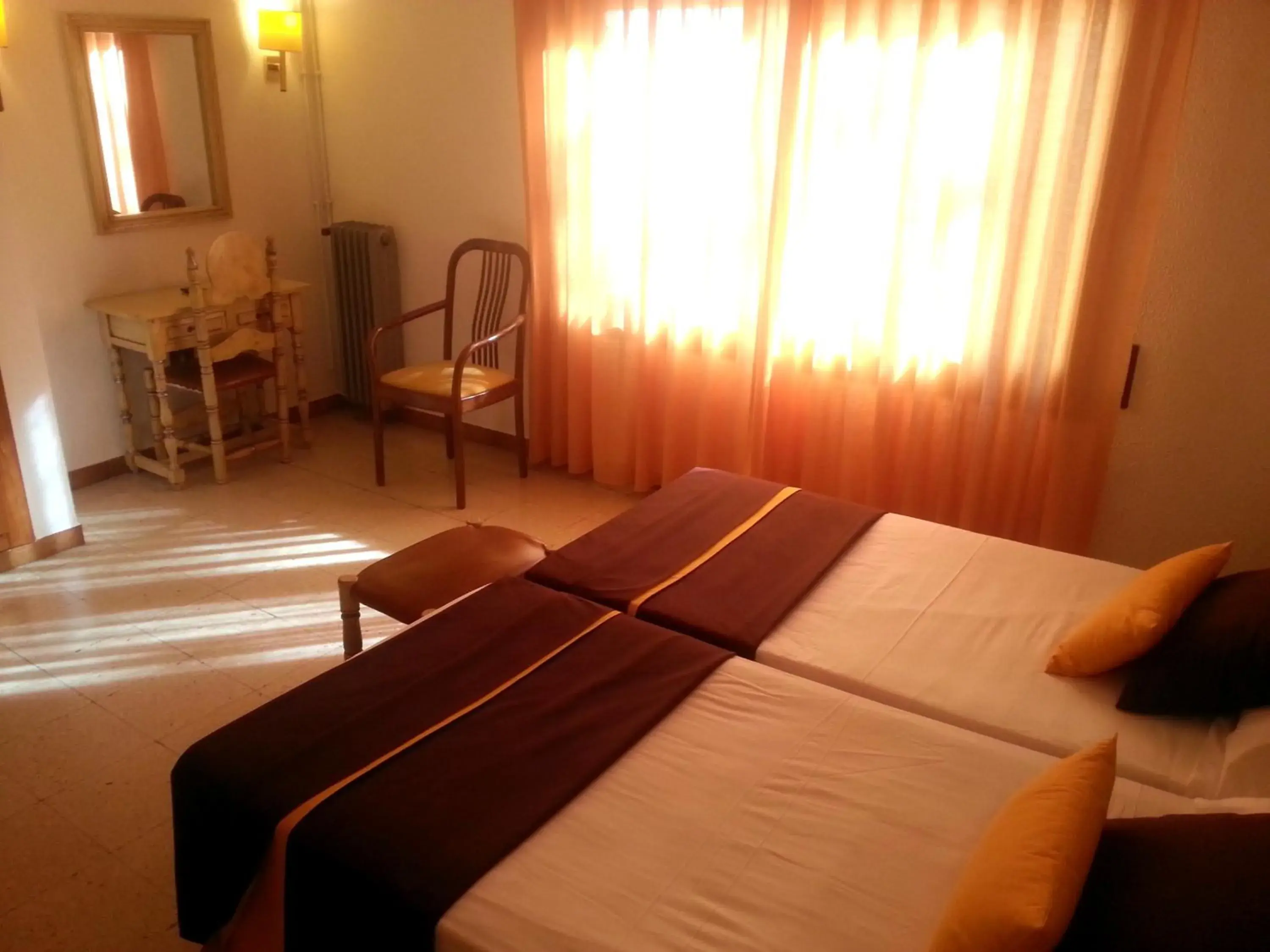 Photo of the whole room, Bed in Hotel Hostal del Sol Photo of the whole room, Bed in Hotel Hostal del Sol