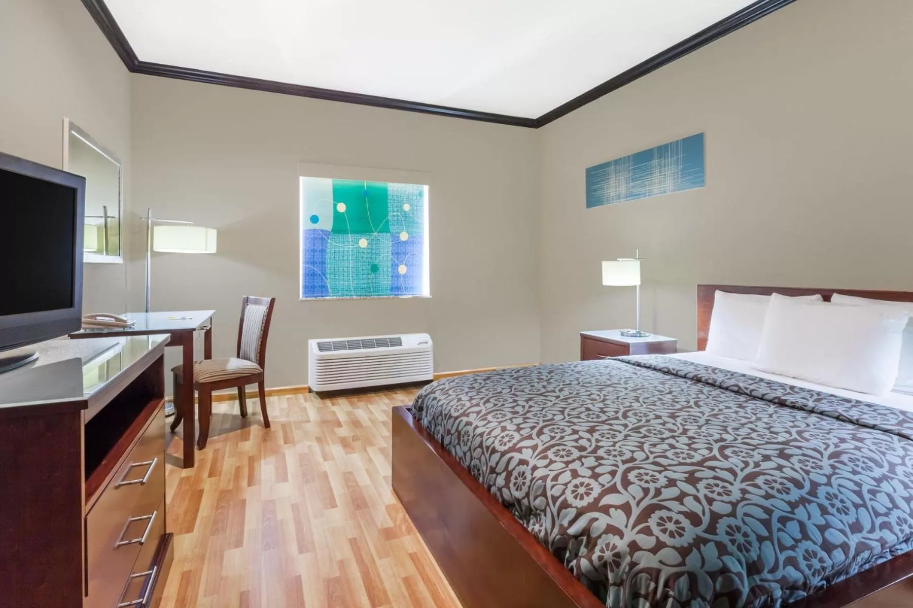 Bed in Days Inn & Suites by Wyndham Marquez