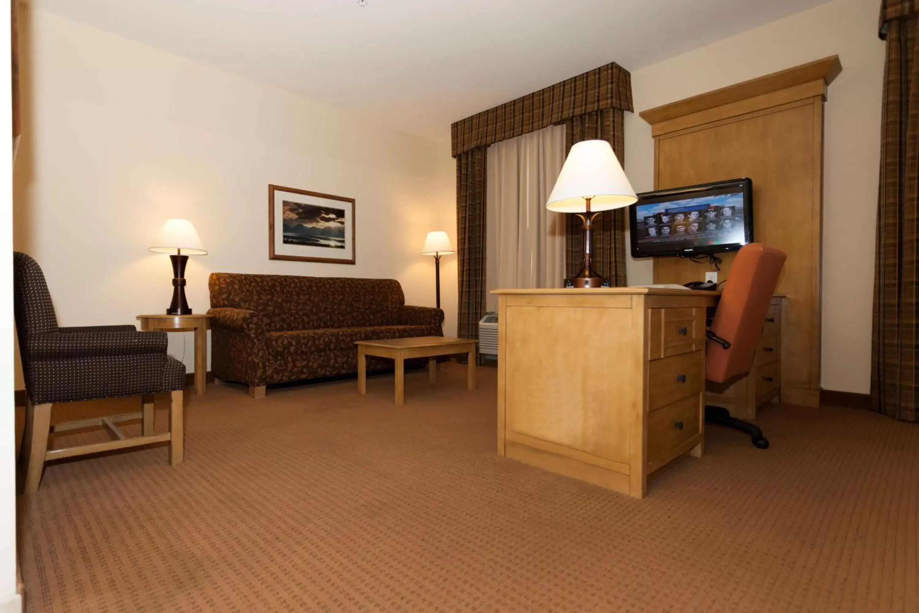 Bed, Seating Area in Hampton Inn & Suites Riverton