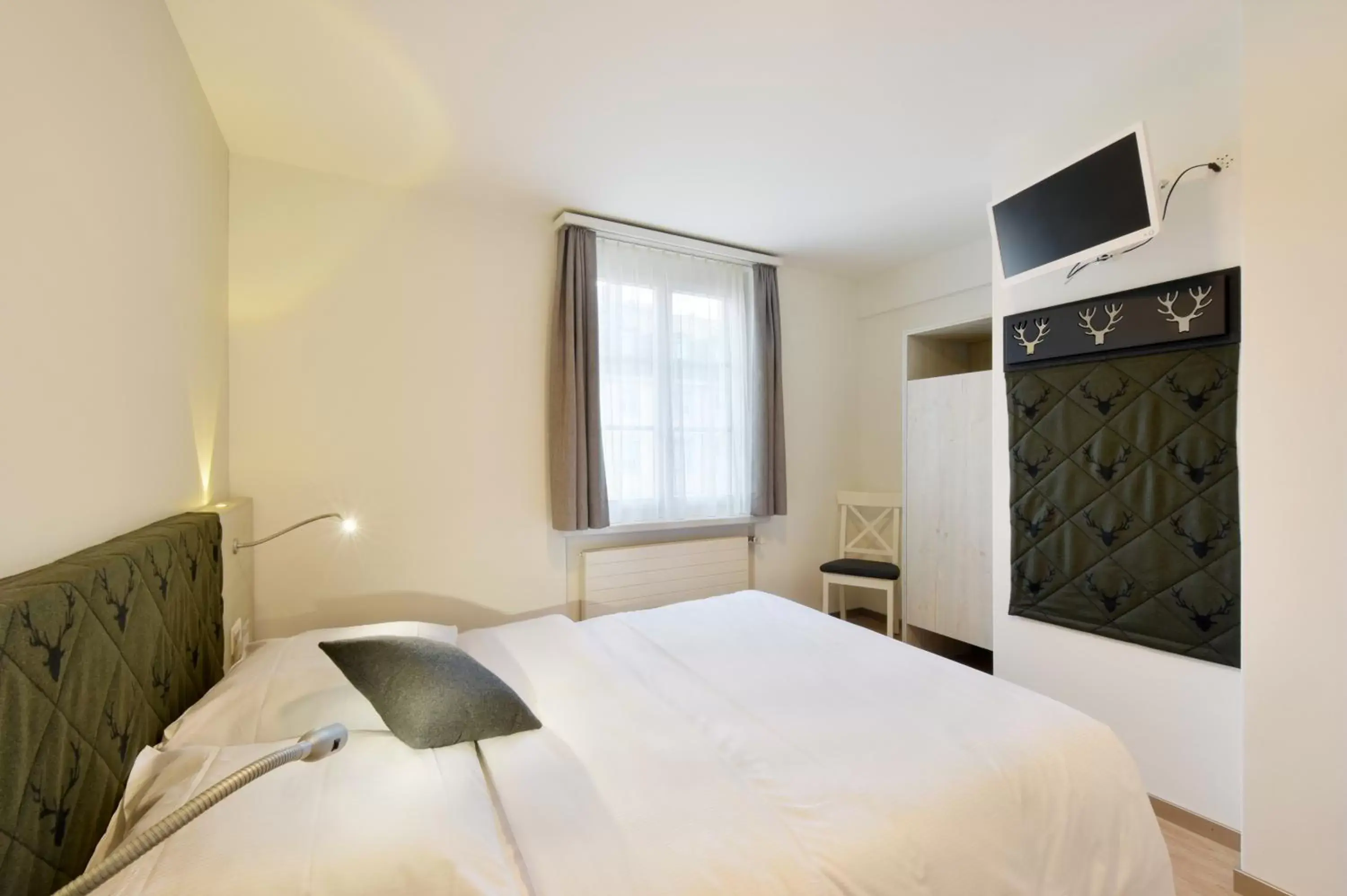 Photo of the whole room, Bed in Hotel Hirschen Photo of the whole room, Bed in Hotel Hirschen