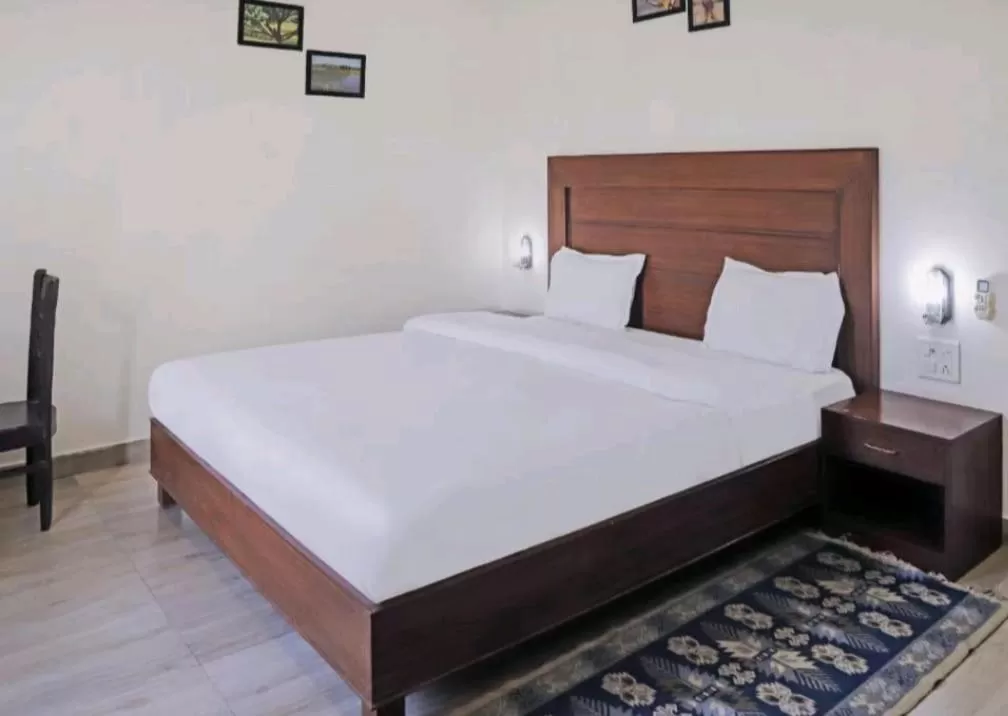 Bed in Hotel Ramayana Khajuraho