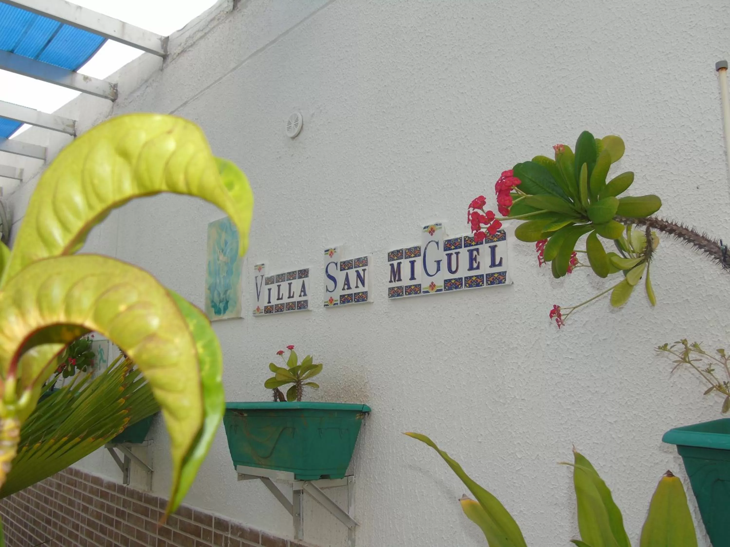 Property logo or sign in Villa San Miguel