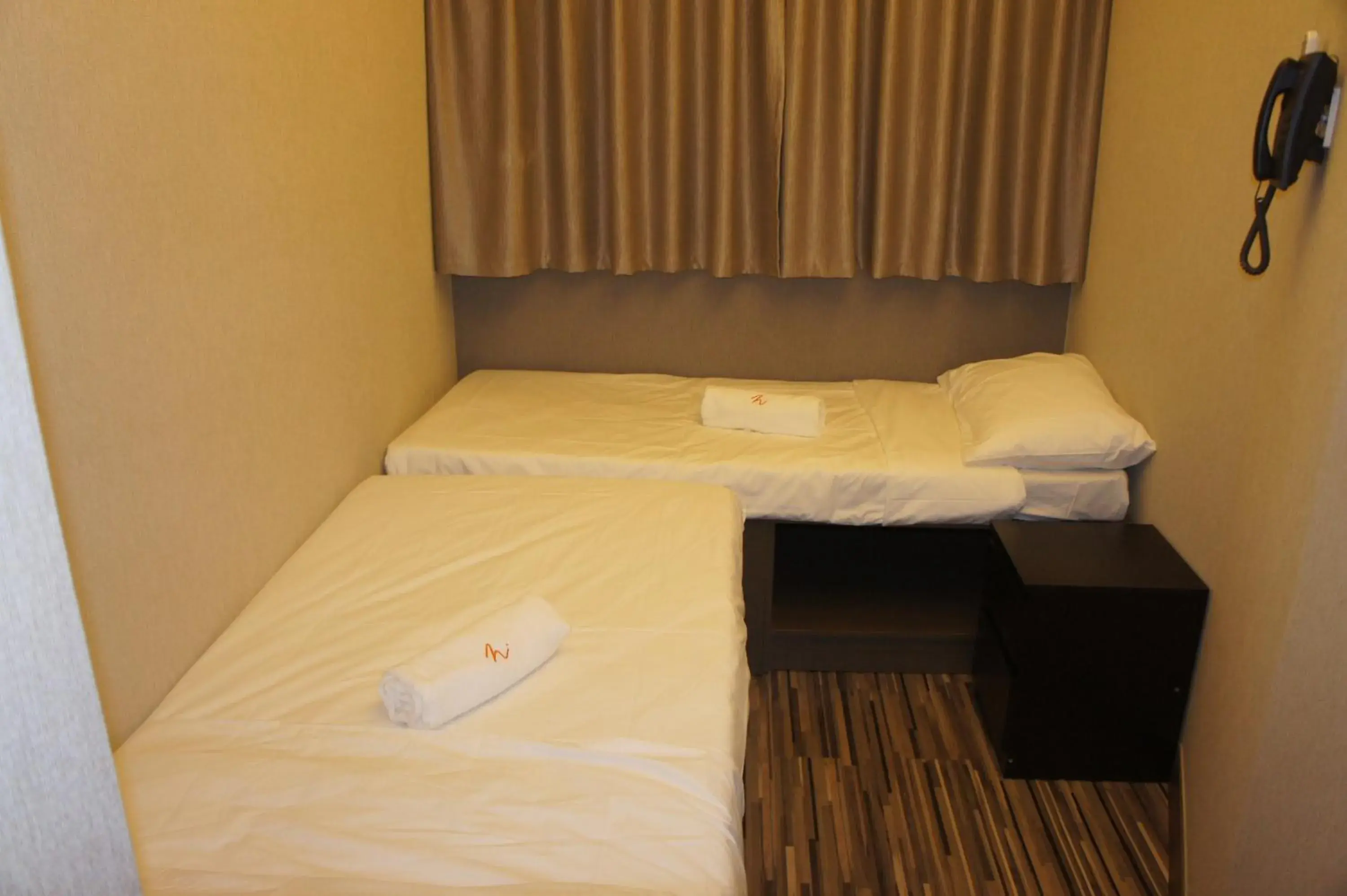Photo of the whole room, Bed in Homy Inn North Point