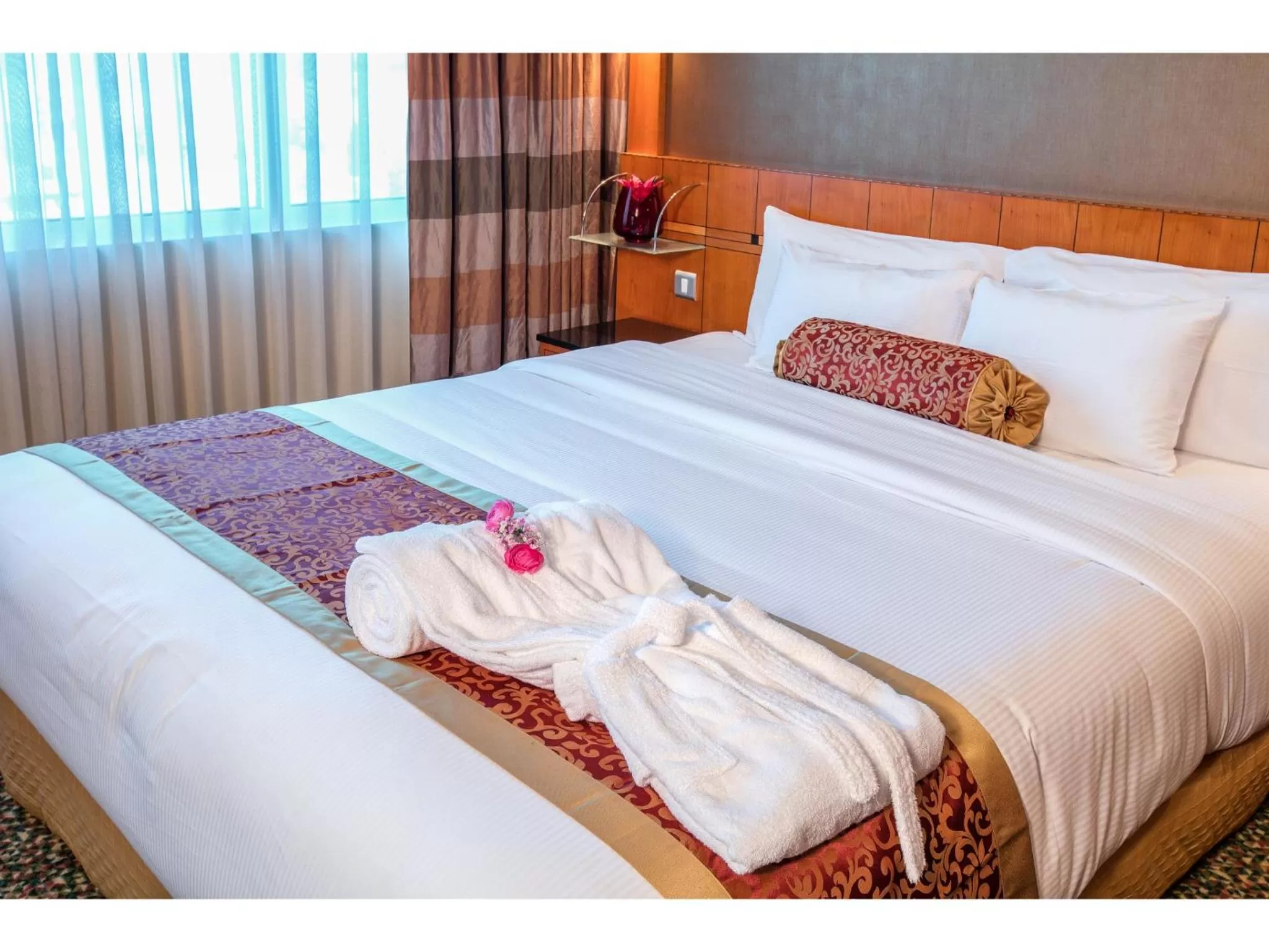 Bed in Gulf Court Hotel