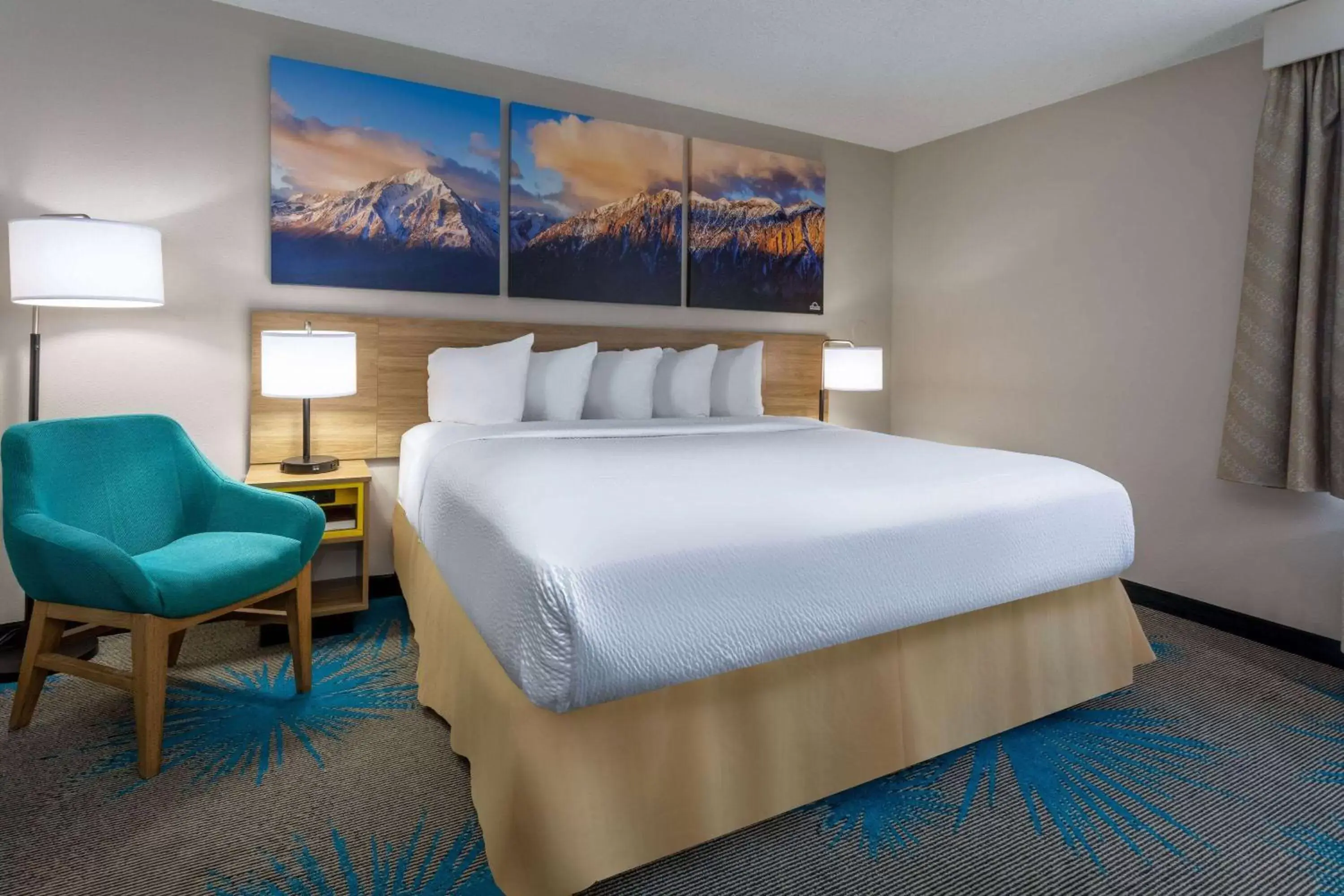 Photo of the whole room, Bed in Days Inn & Suites by Wyndham Denver International Airport