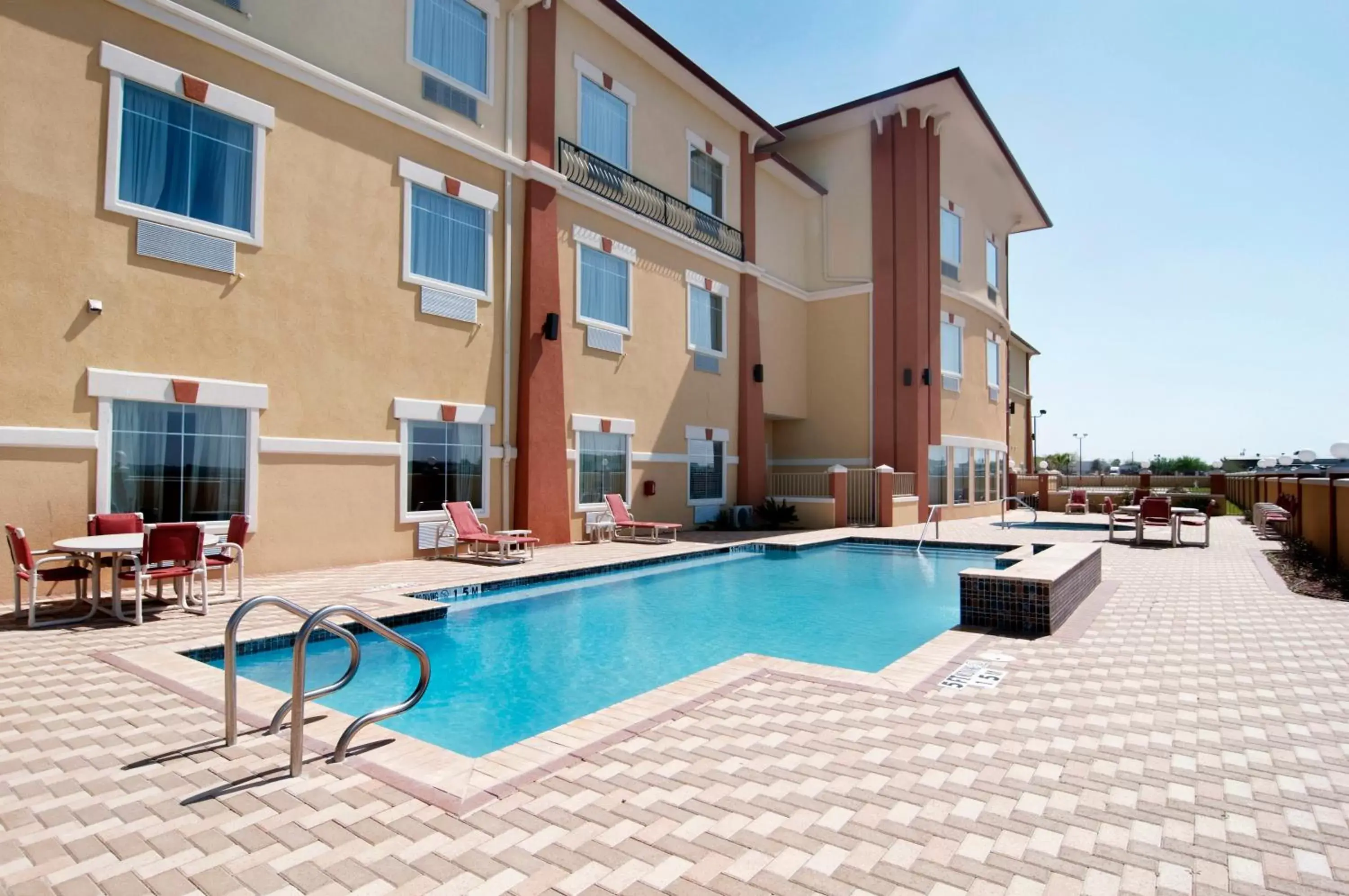 Swimming pool, Property Building in Super 8 by Wyndham Hidalgo at La Plaza Mall & Mcallen Airport