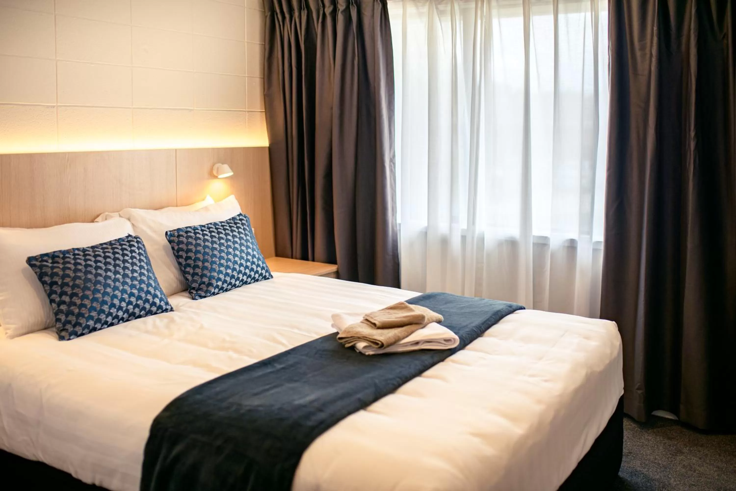 Bedroom, Bed in Takapuna International Motor Lodge