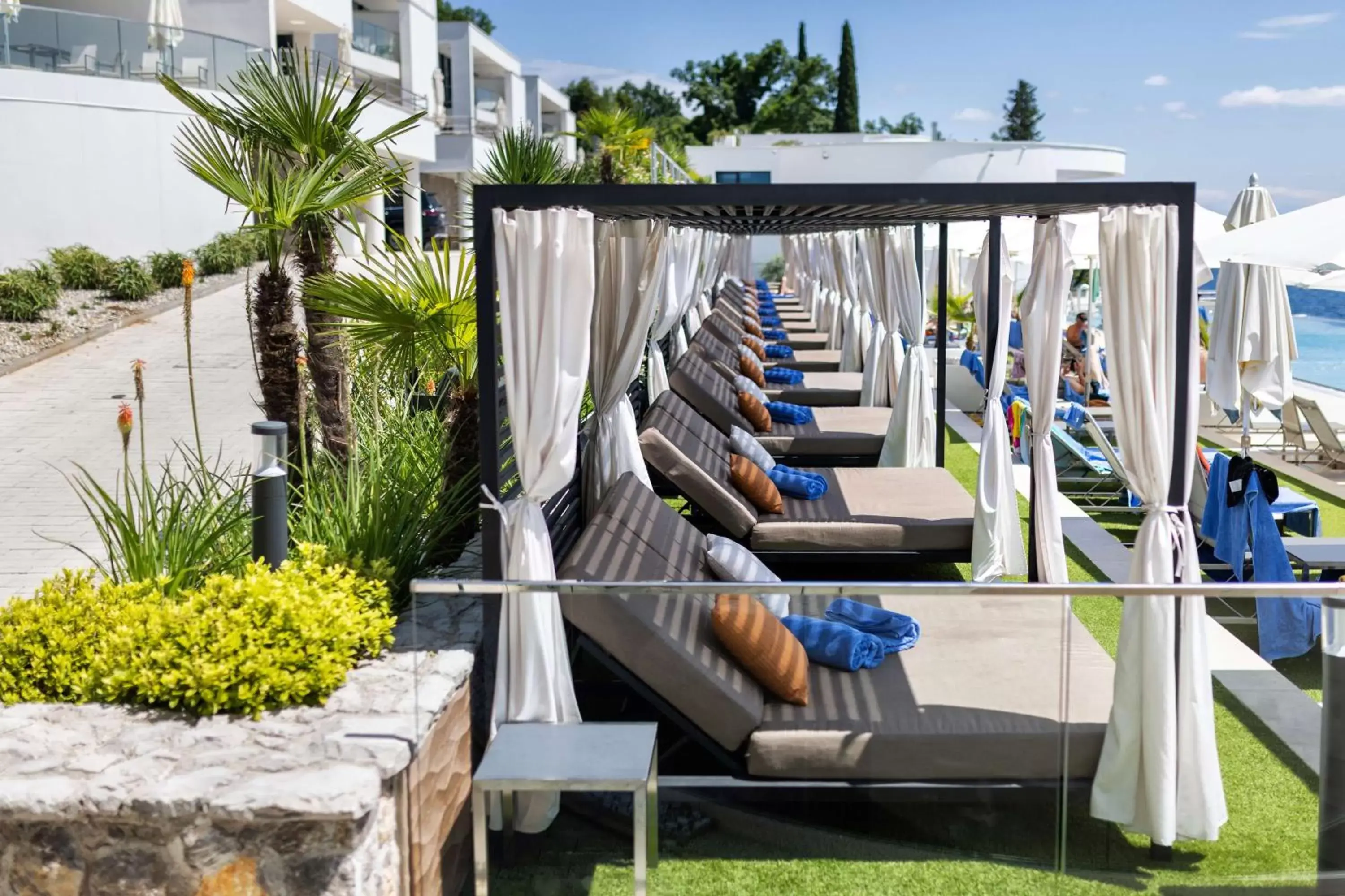 Inner courtyard view in Hilton Rijeka Costabella Beach Resort And Spa Inner courtyard view in Hilton Rijeka Costabella Beach Resort And Spa