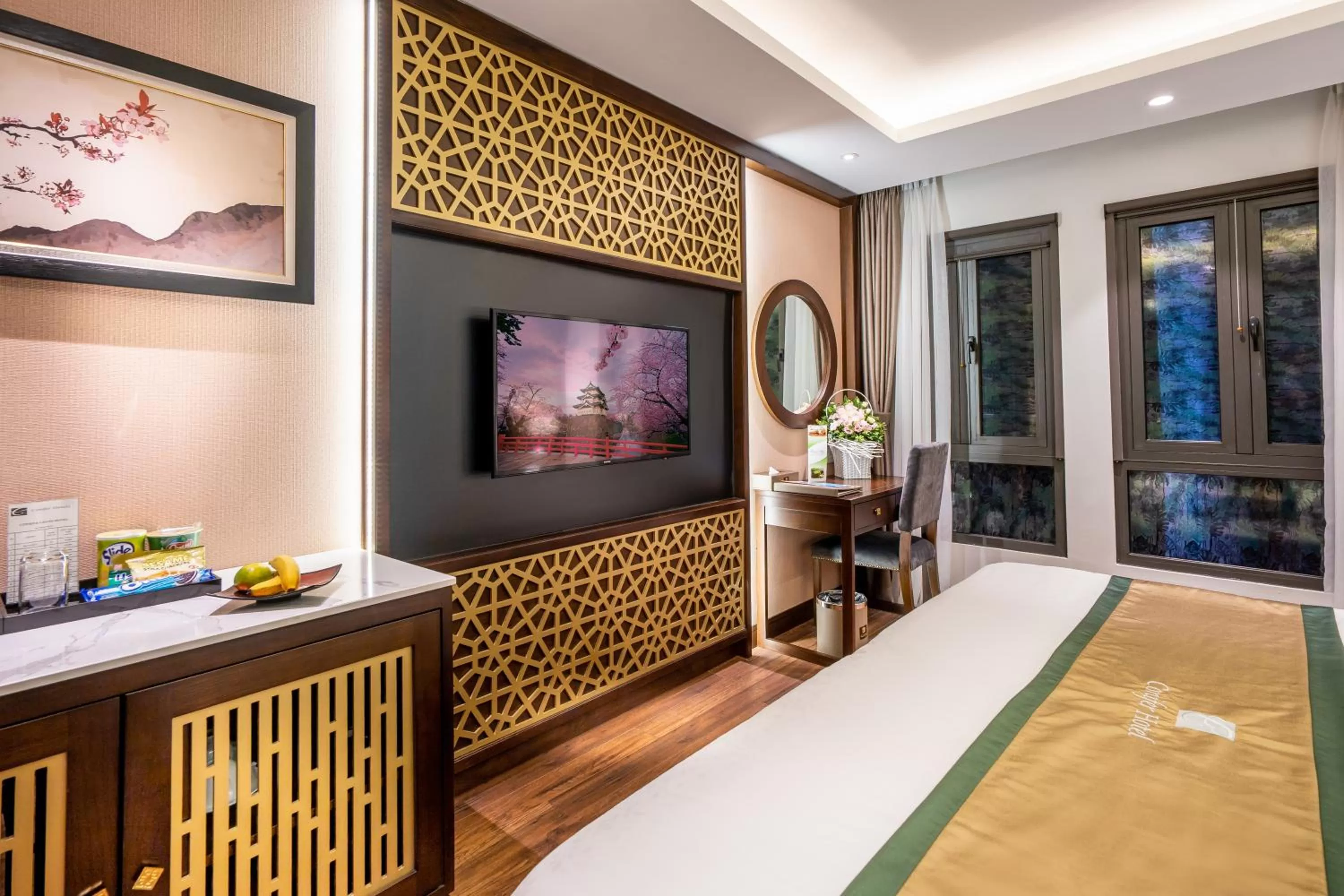 Bed in Conifer Grand Hotel