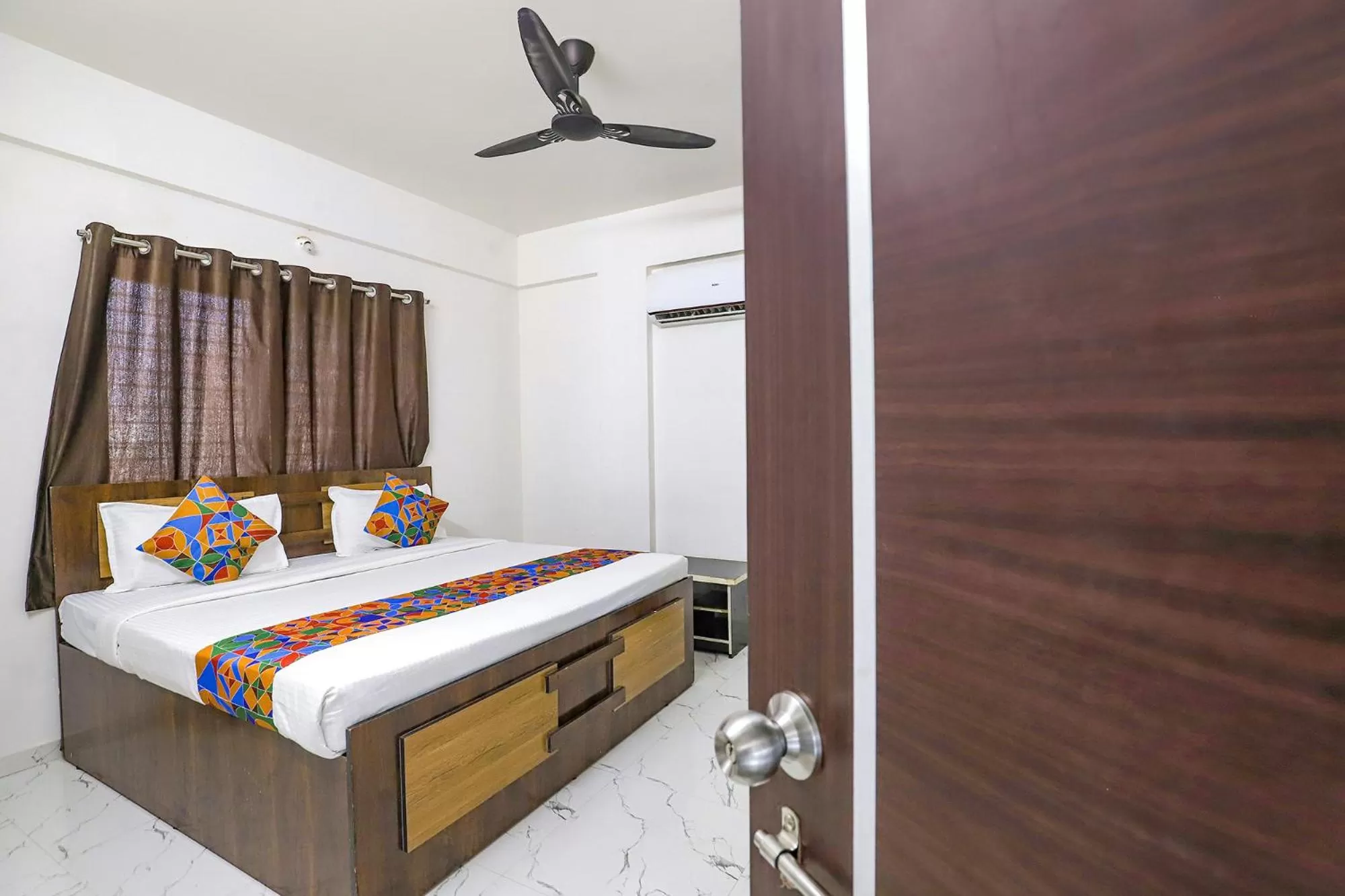 Bed in FabHotel Elite Palm