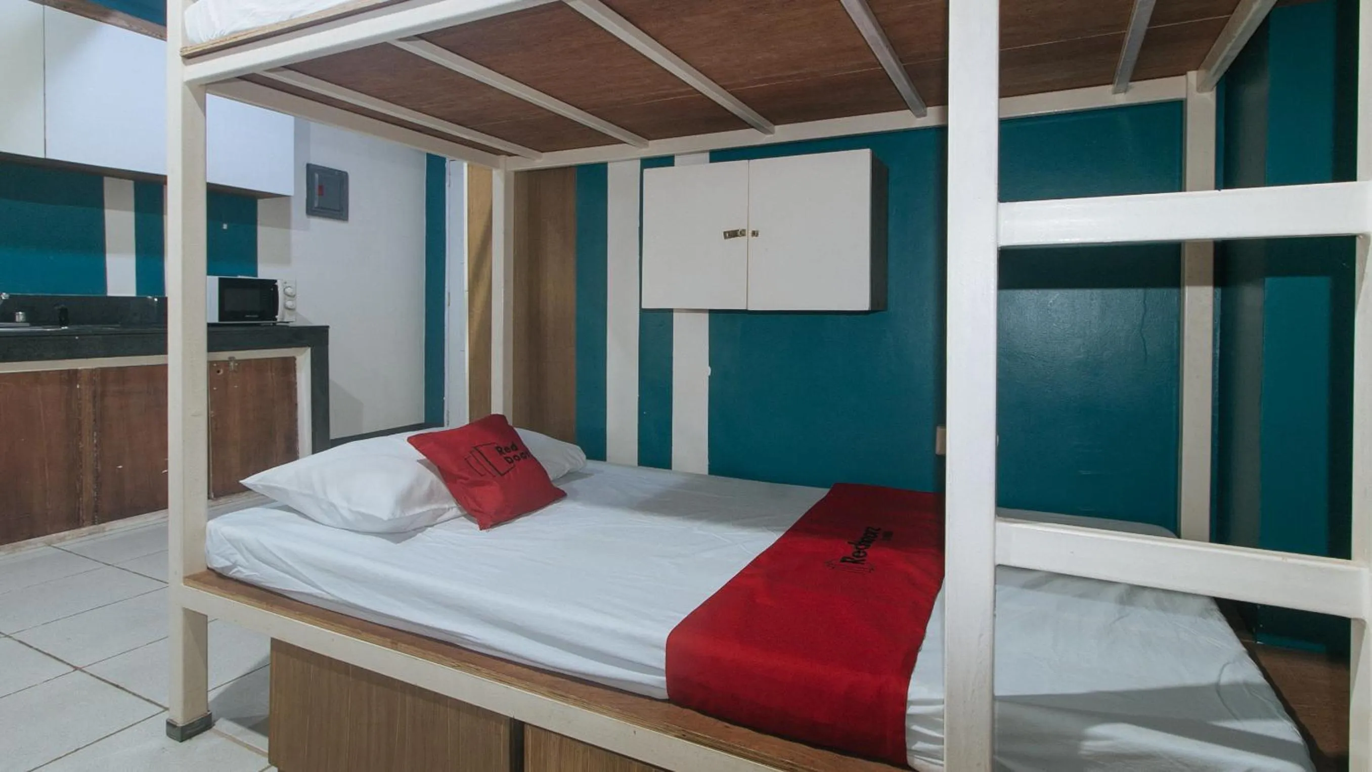 Bedroom, Bed in RedDoorz at Crowne One Condo