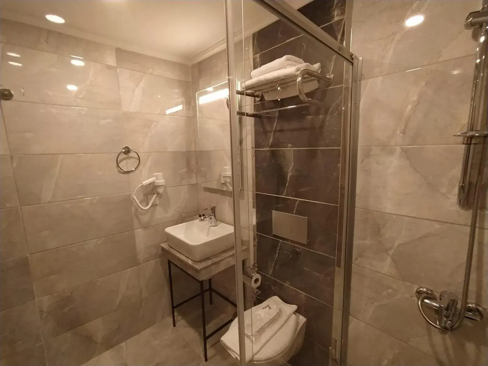 Bathroom in NUPERA HOTEL