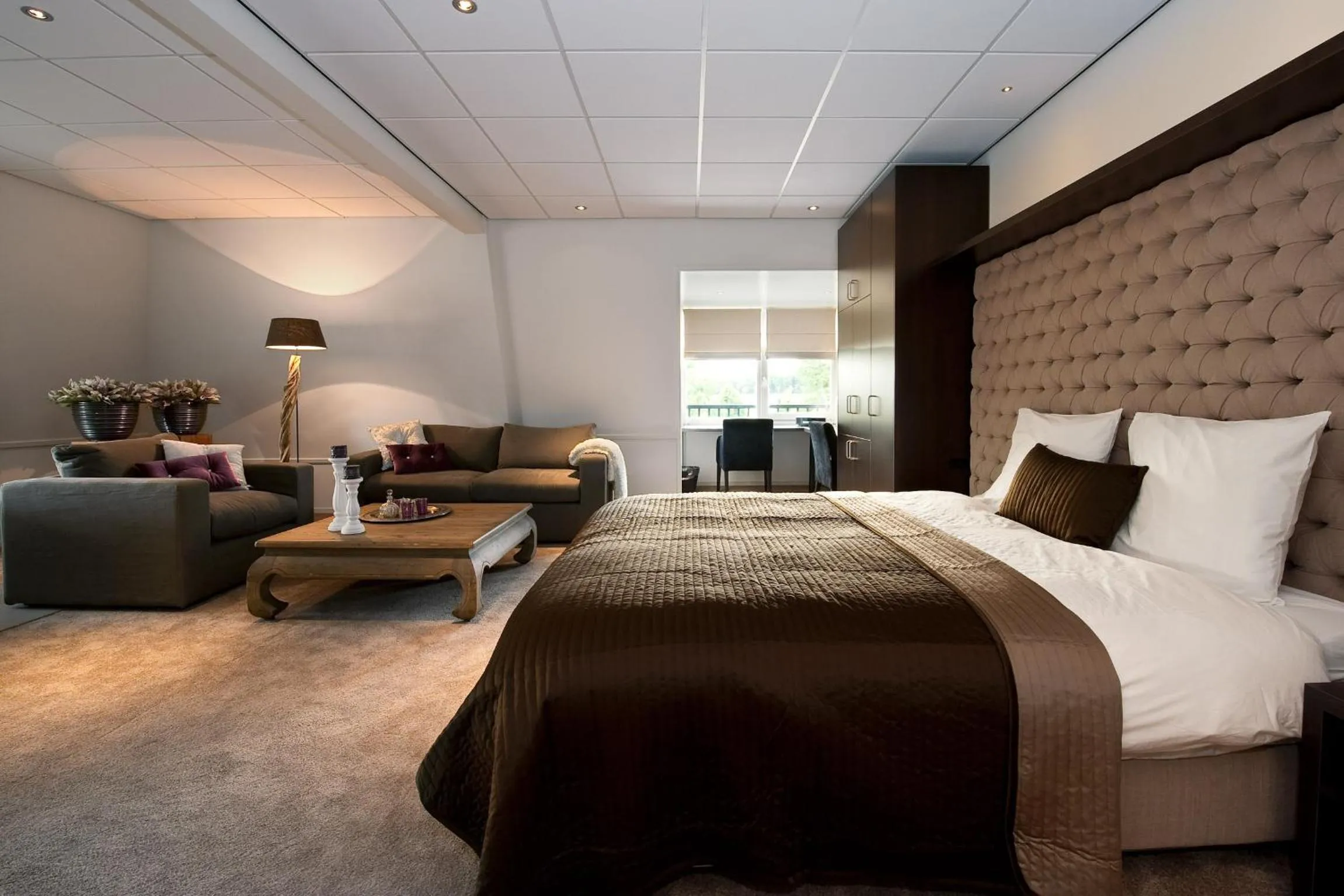 Living room, Bed in Grenshotel de Jonckheer