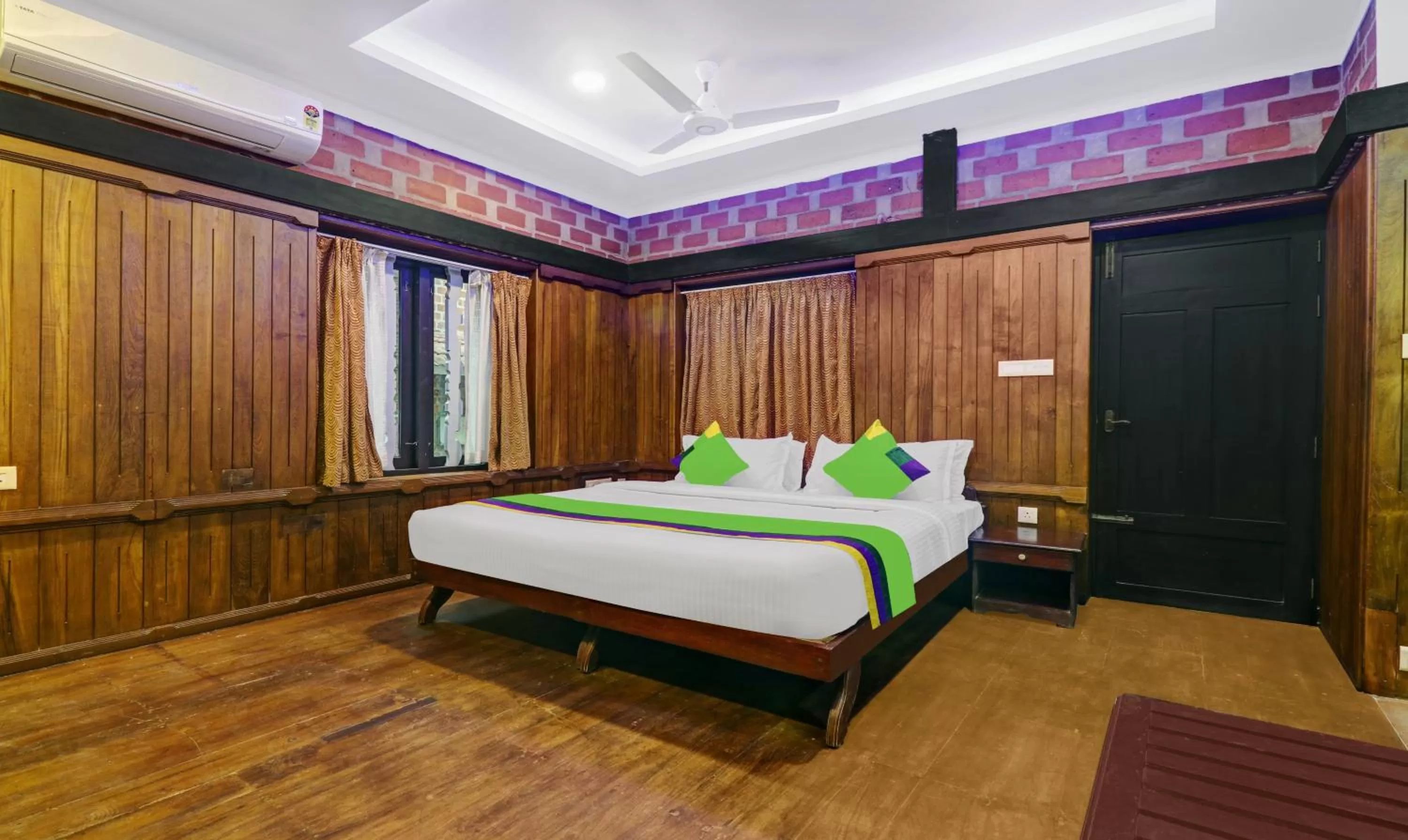 Bed in Treebo Trend God'S Own Country Ayurveda Resorts