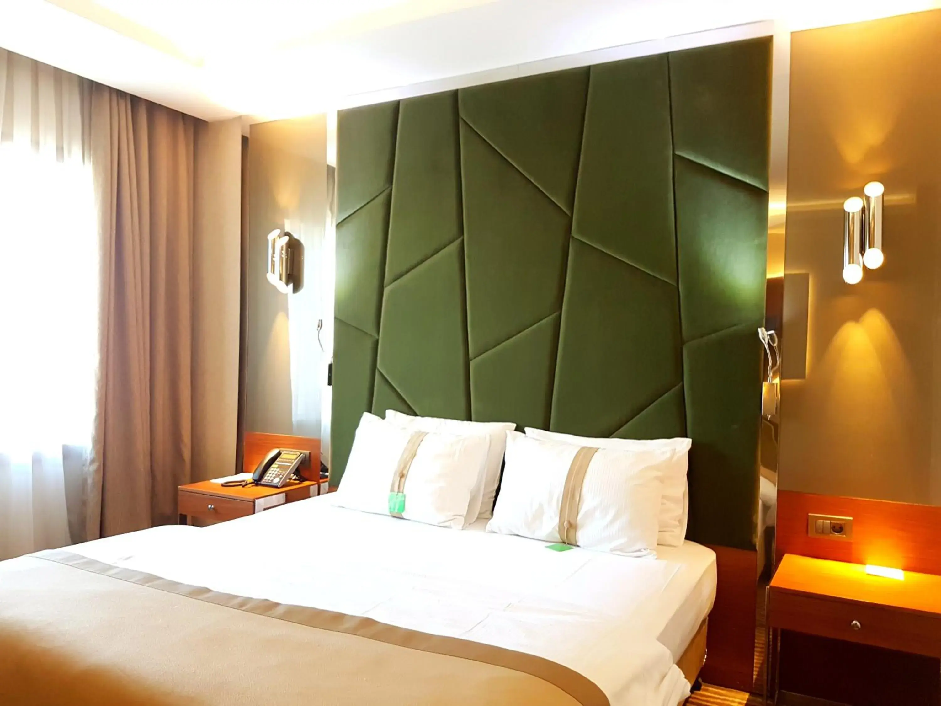 Bed in Holiday Inn Gaziantep, an IHG Hotel