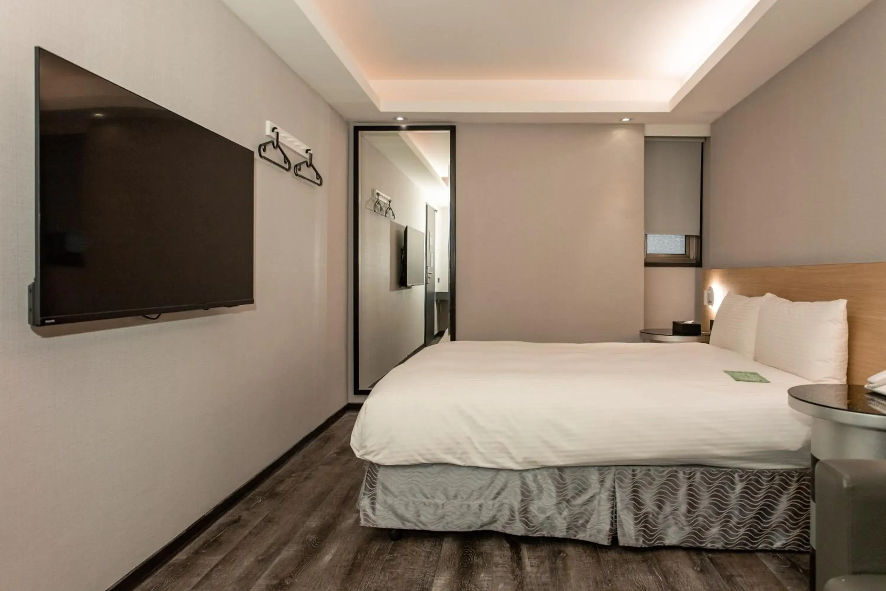 Bed in Hub Hotel Tucheng