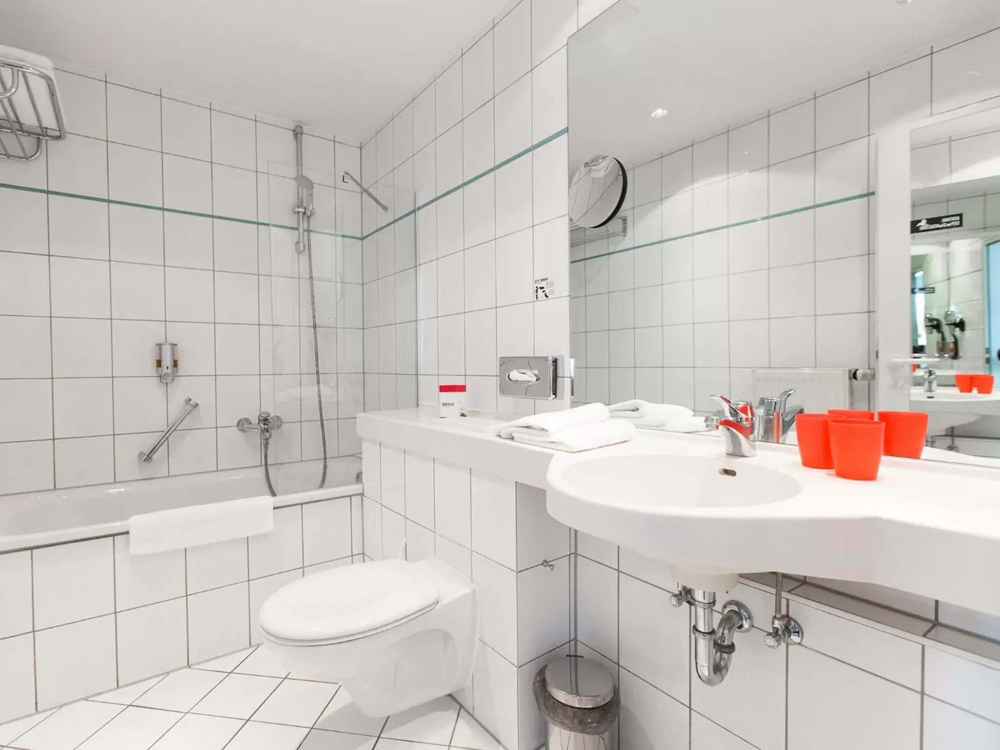 Bathroom in DORMERO Hotel Dresden Airport