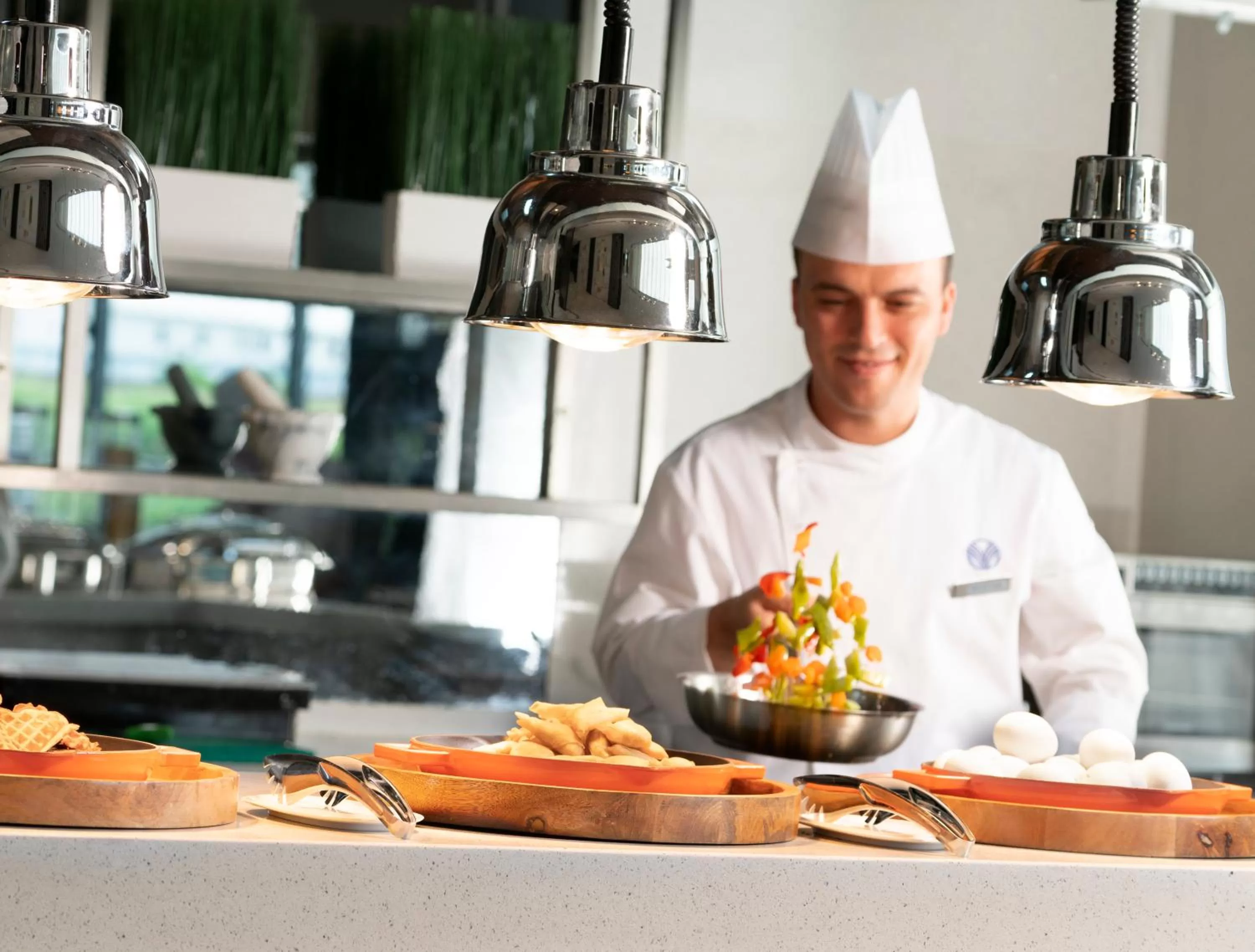 Communal kitchen in WestSide Residences by Rotana