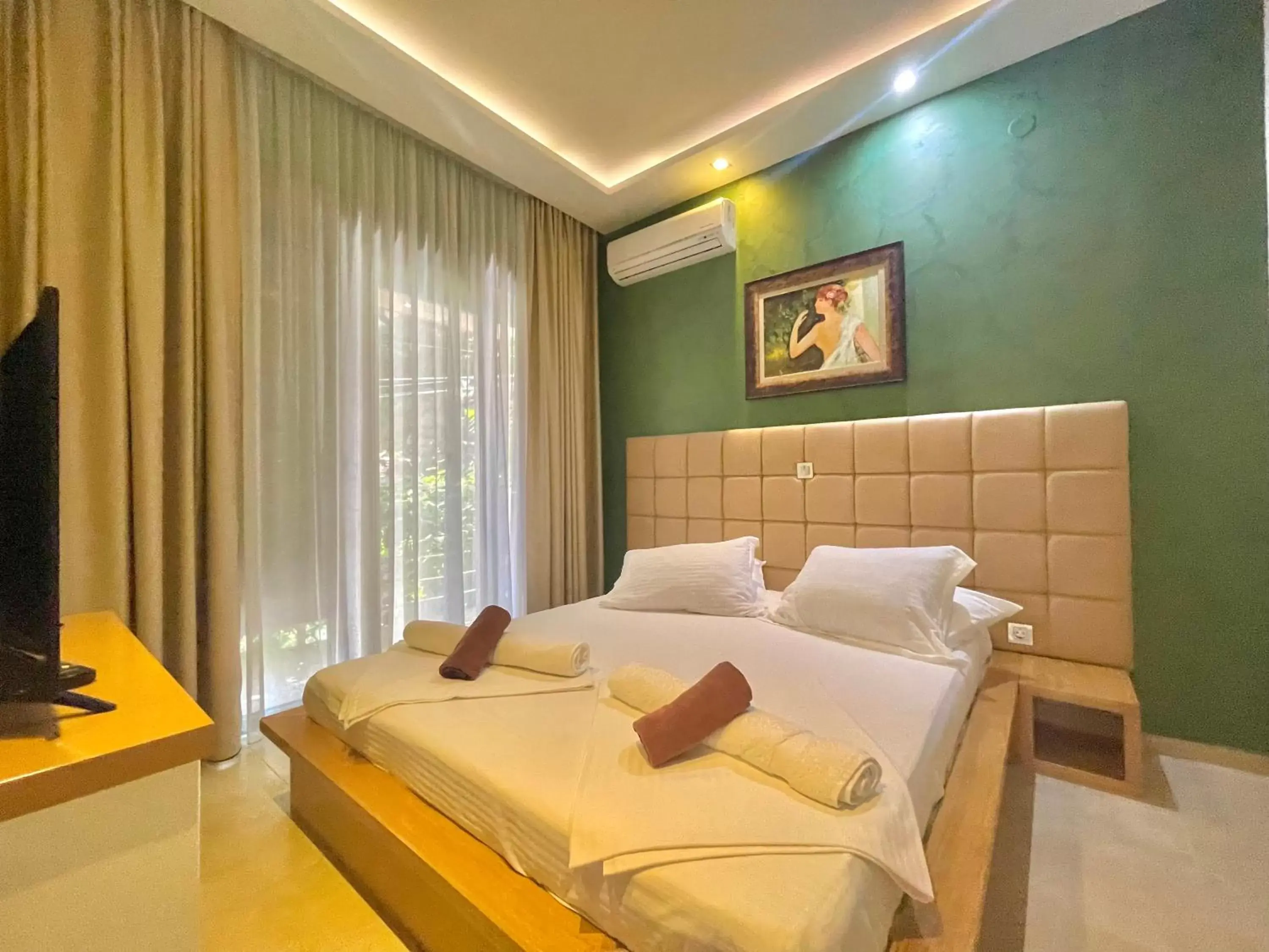 Bed in Hotel Butua Residence