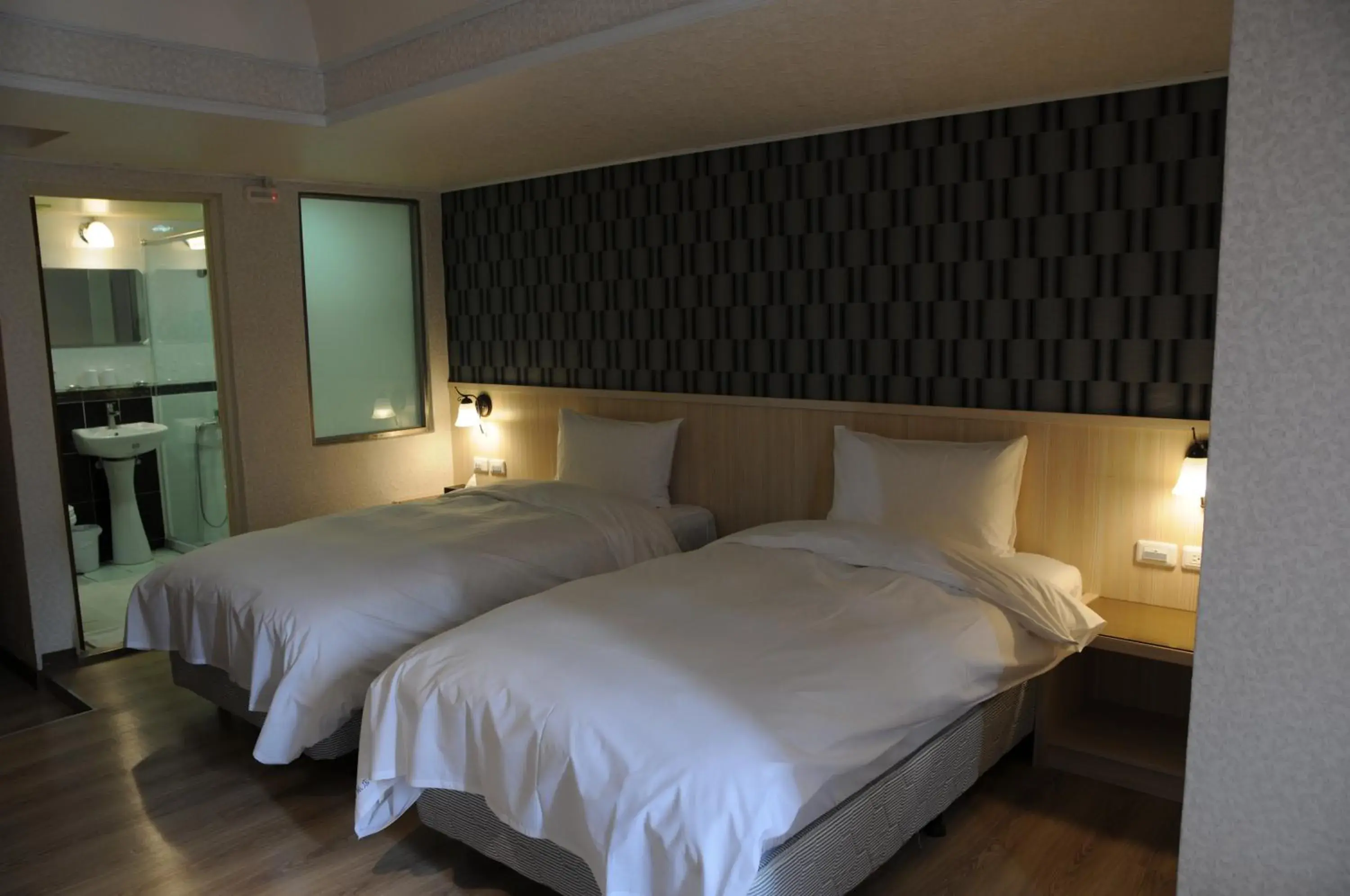 Bed in Sung Tai Hotel