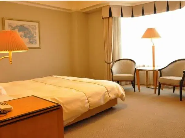 Bed in Imabari Kokusai Hotel