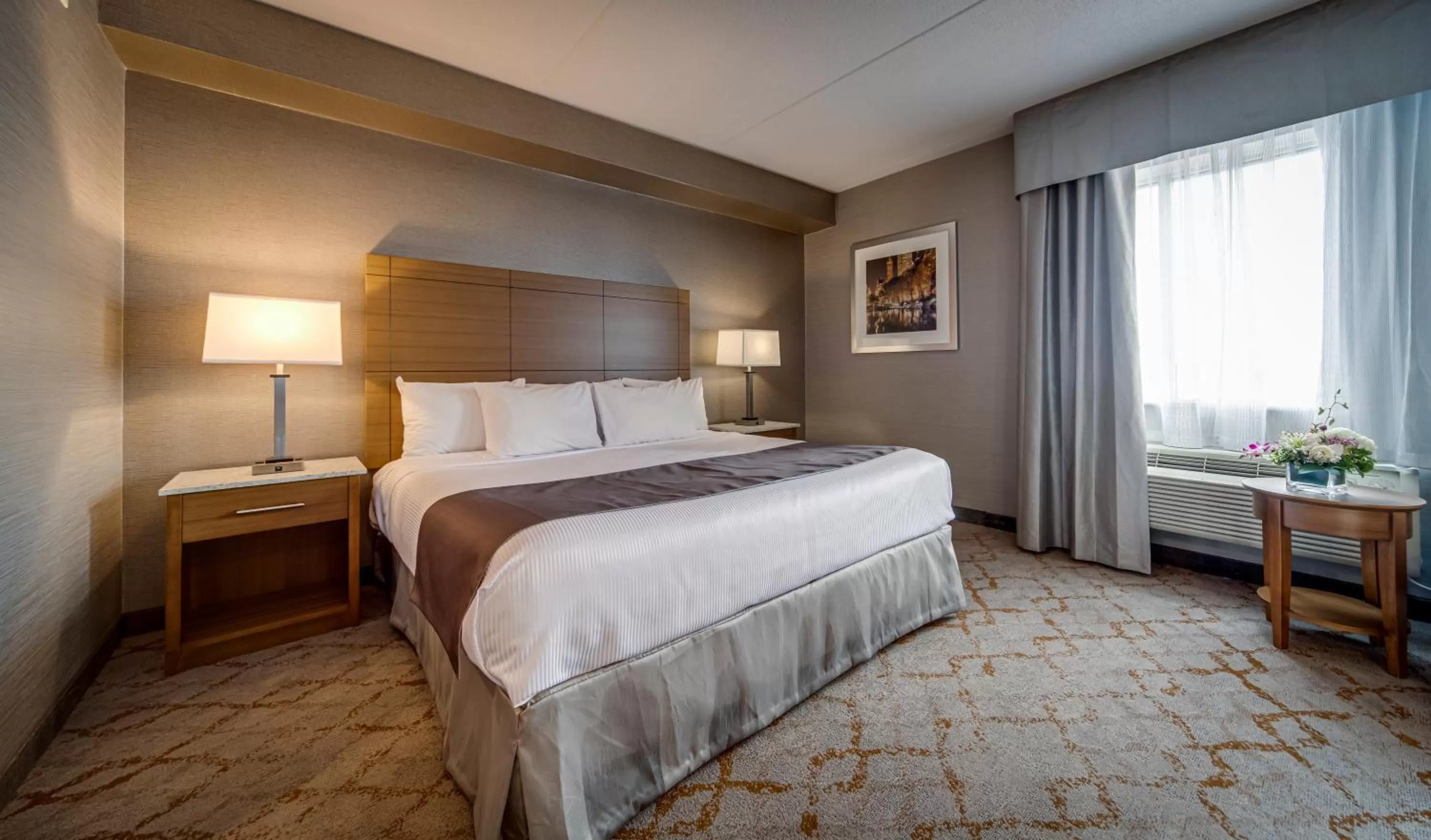 Bed in Monte Carlo Inn Vaughan Suites