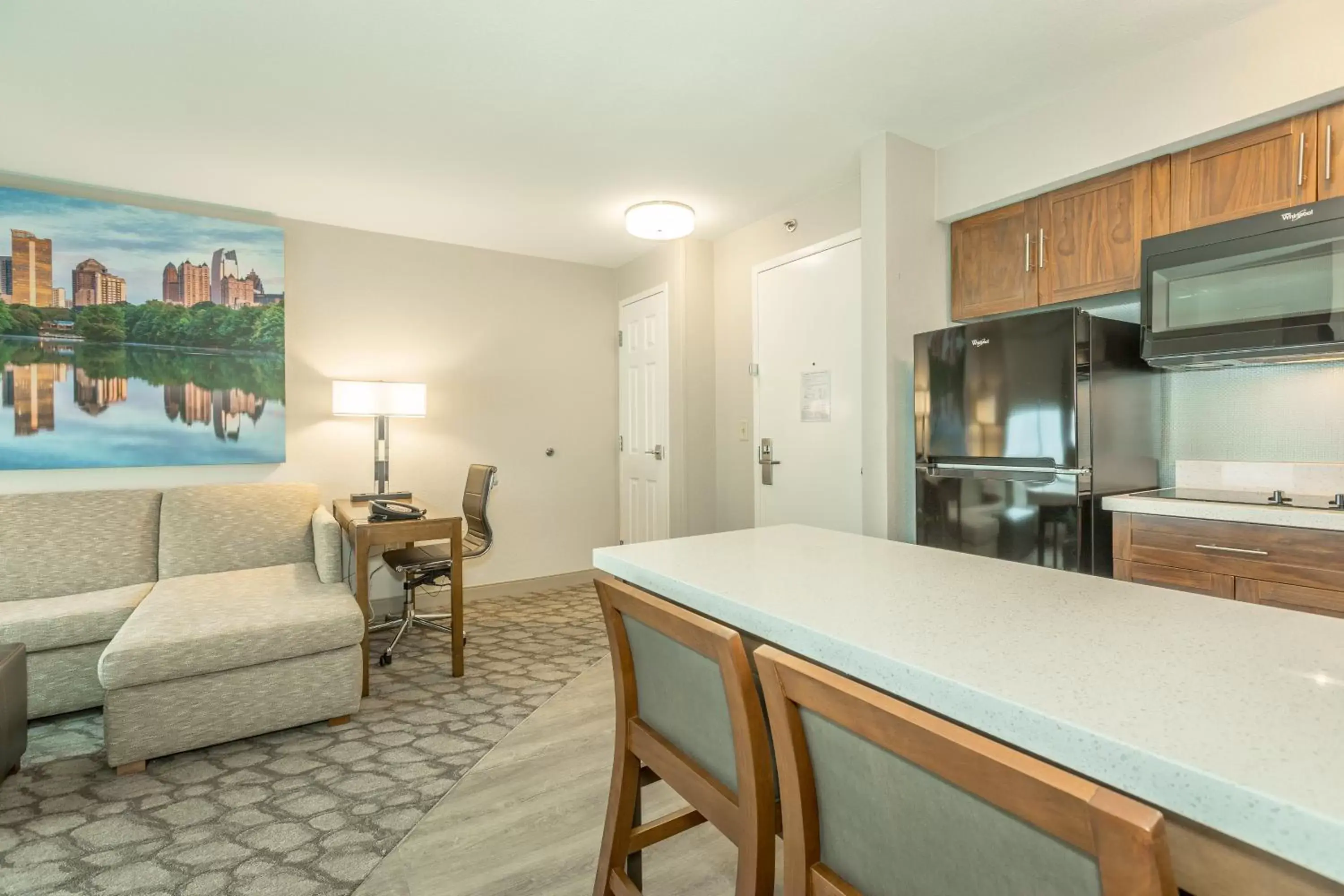 Photo of the whole room, Kitchen/Kitchenette in Holiday Inn Hotel and Suites Peachtree City, an IHG Hotel