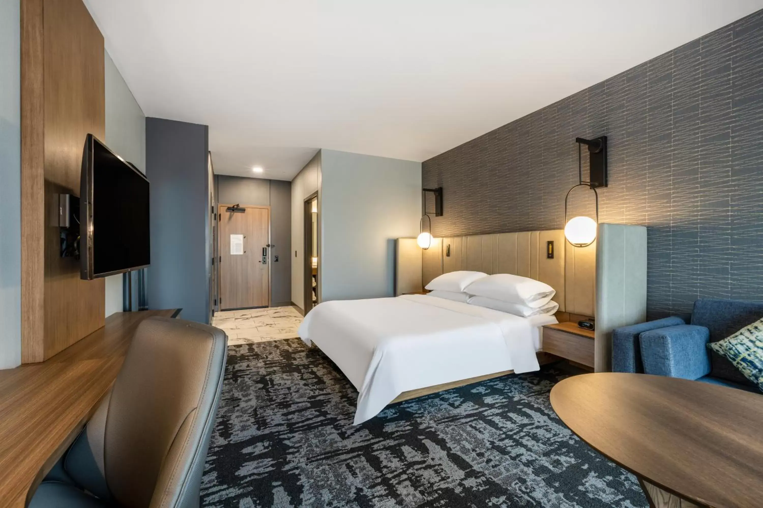 Bed in Crowne Plaza - Kearney, an IHG Hotel