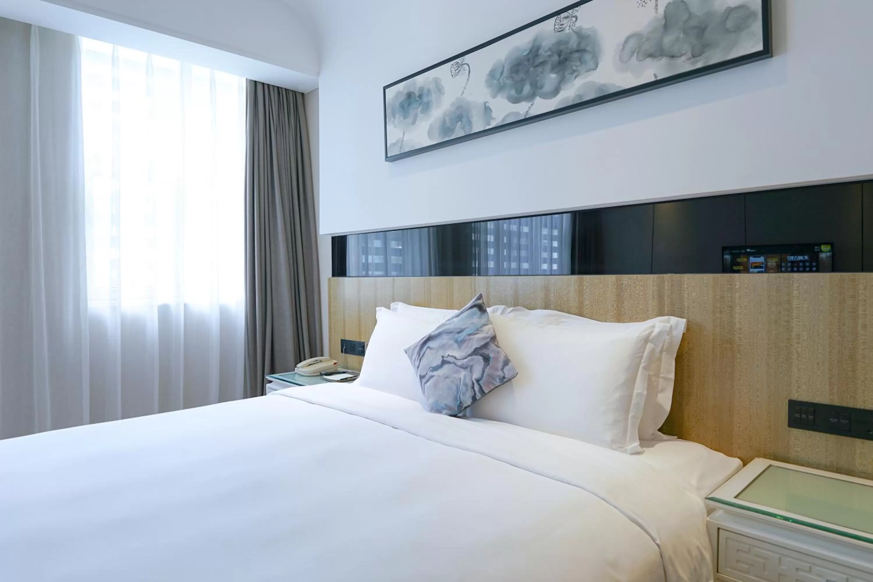 Bed in Paco Hotel Tiyuxilu Metro Guangzhou-Free Shuttle Bus fir Canton Fair