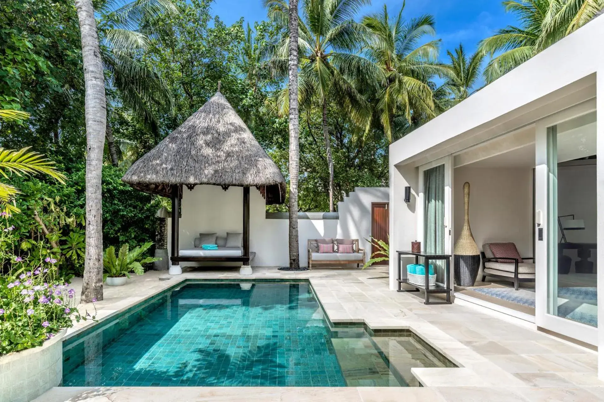 Photo of the whole room, Swimming Pool in Four Seasons Resort Maldives at Kuda Huraa