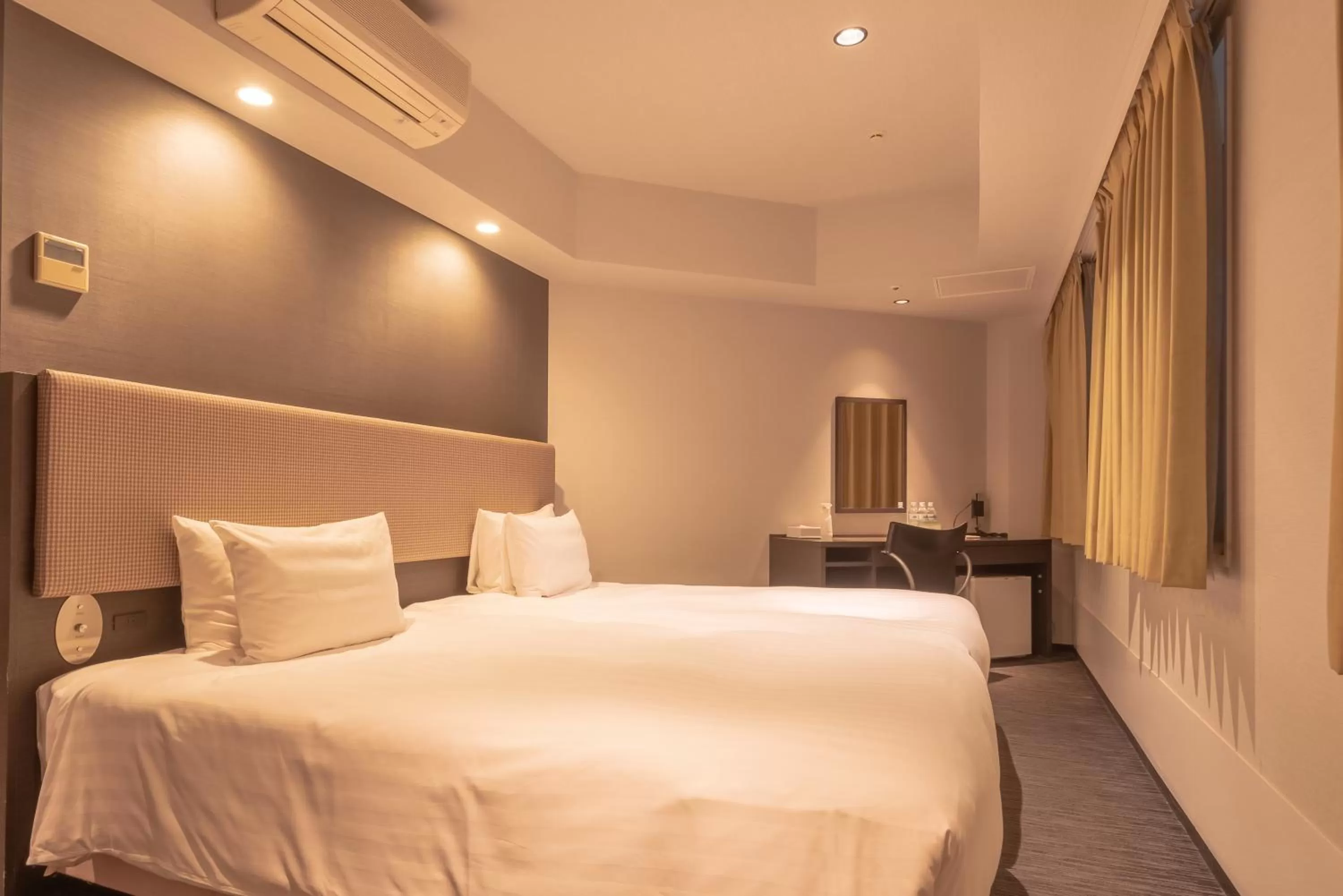 Bed in E Hotel Higashi Shinjuku