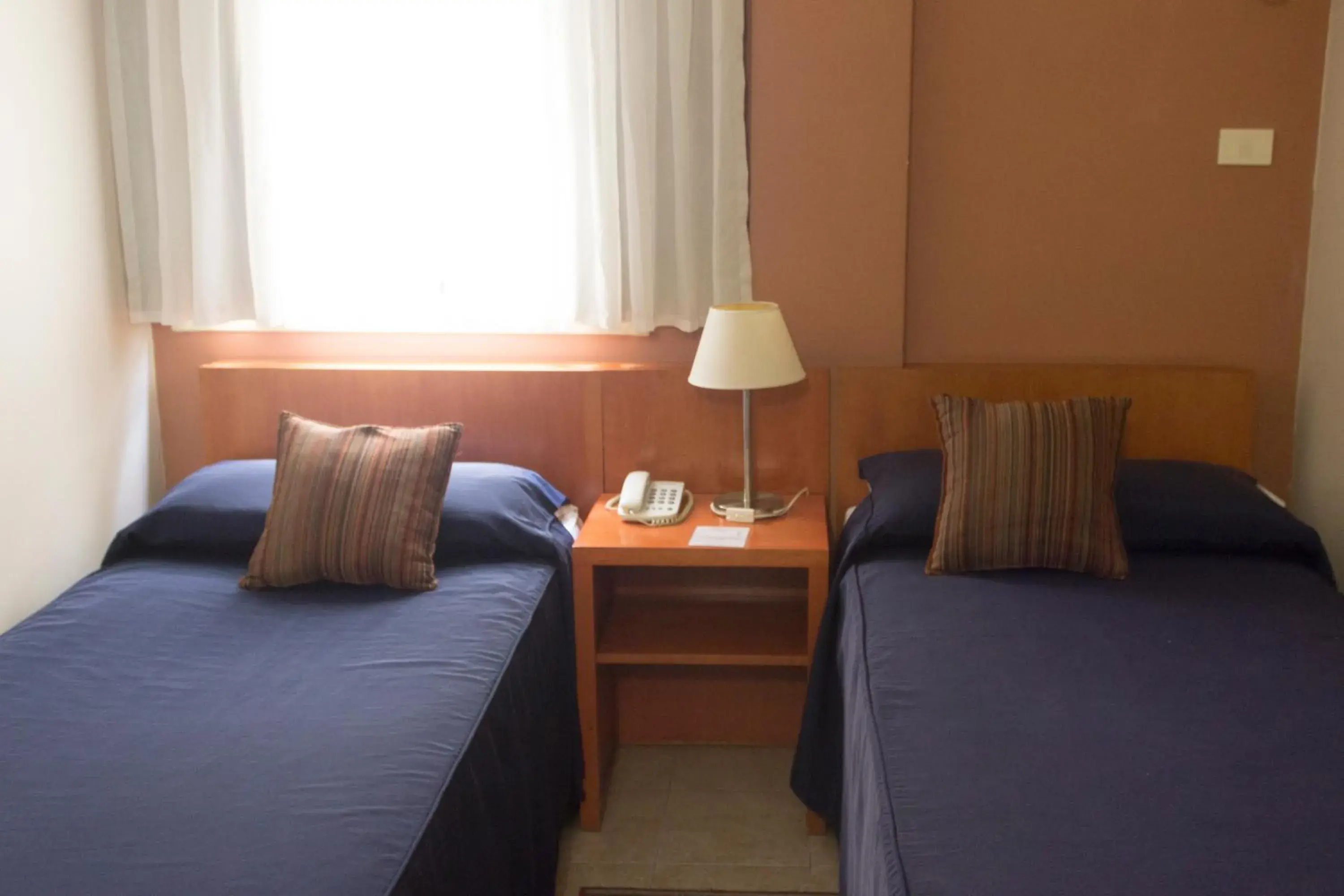 Bed in Hotel UTHGRA de las Luces Bed in Hotel UTHGRA de las Luces