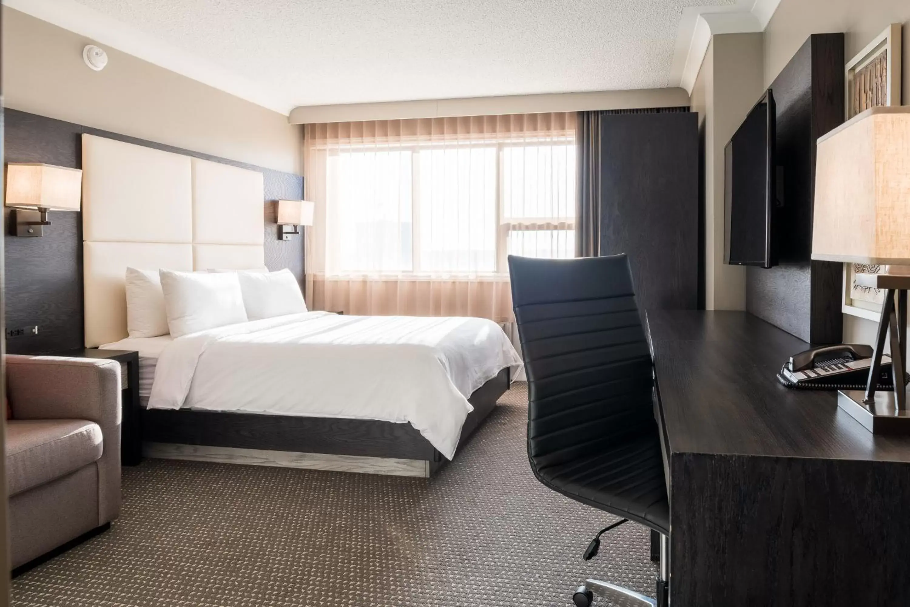 Photo of the whole room, Bed in Crowne Plaza Hotel Moncton Downtown, an IHG Hotel