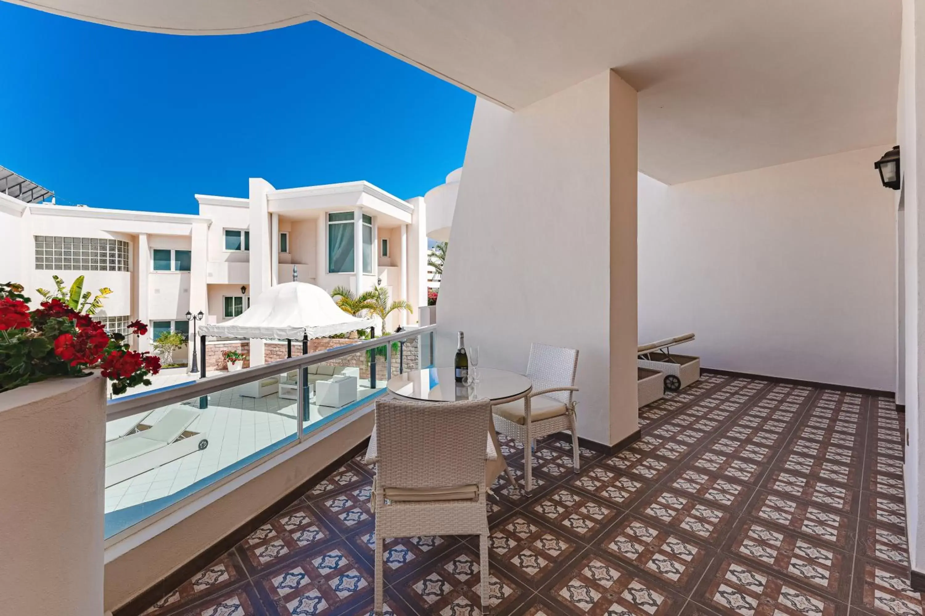 Balcony/Terrace, Pool View in Flamingo Suites Boutique Hotel