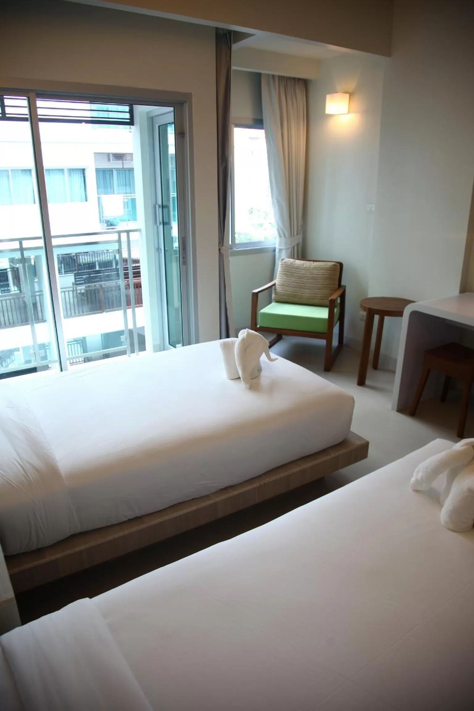 Bed in Sunshine Hotel & Residences