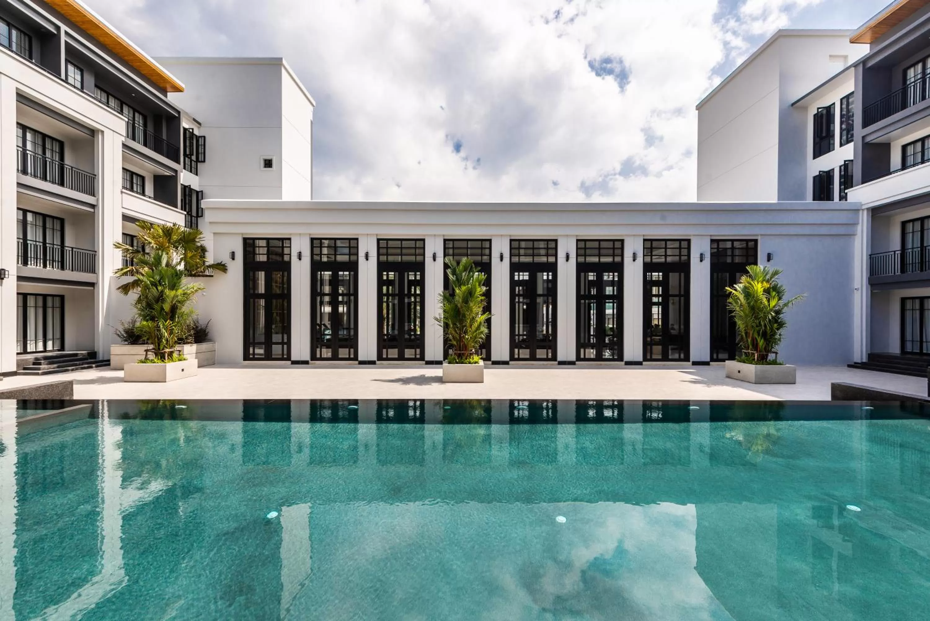 Swimming pool in One Patio Hotel Pattaya - SHA Extra Plus