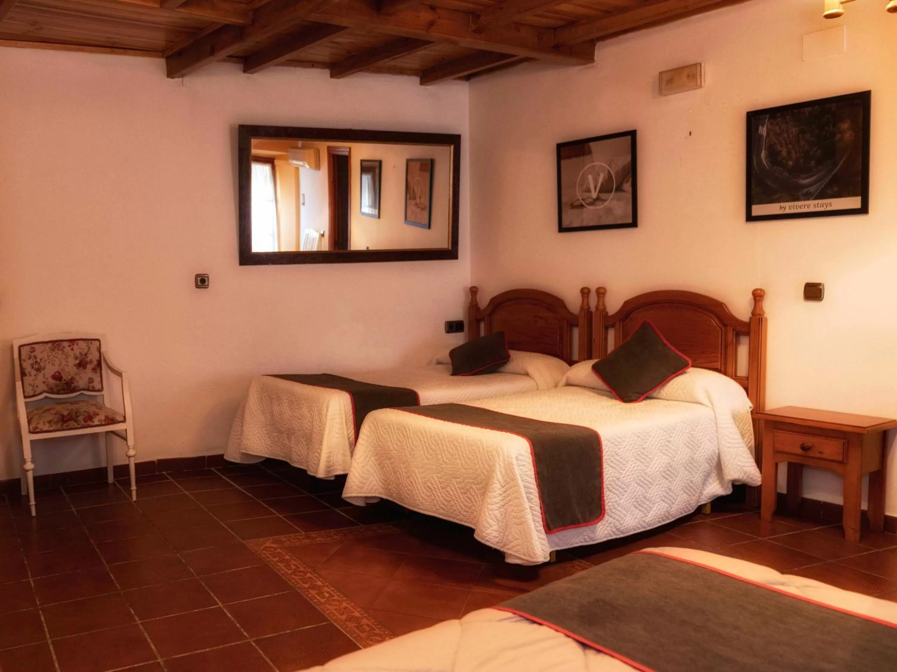 Bed in Hotel Las Palmeras by Vivere Stays