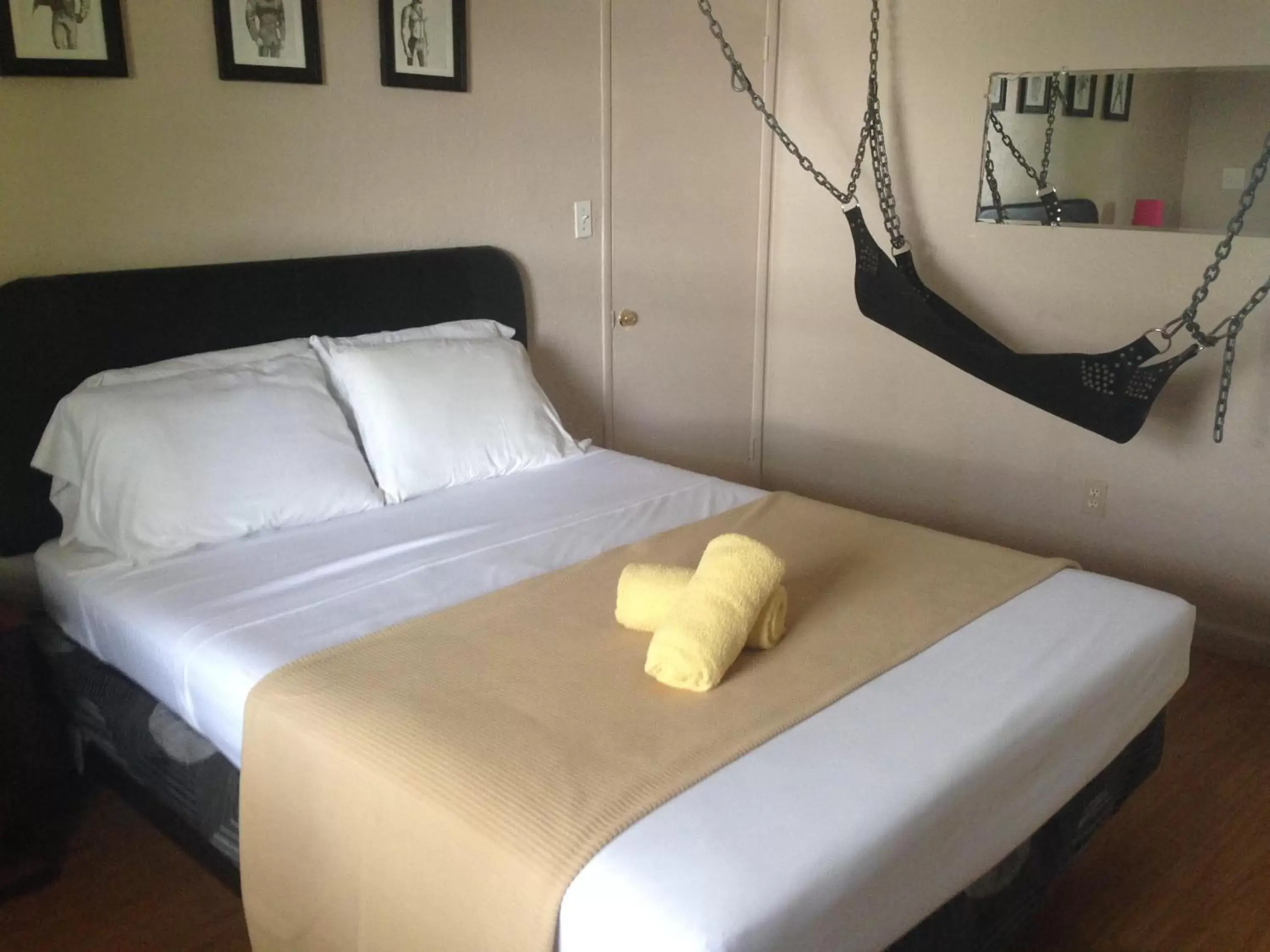 Bed in INN LEATHER GUEST HOUSE-GAY MALE ONLY