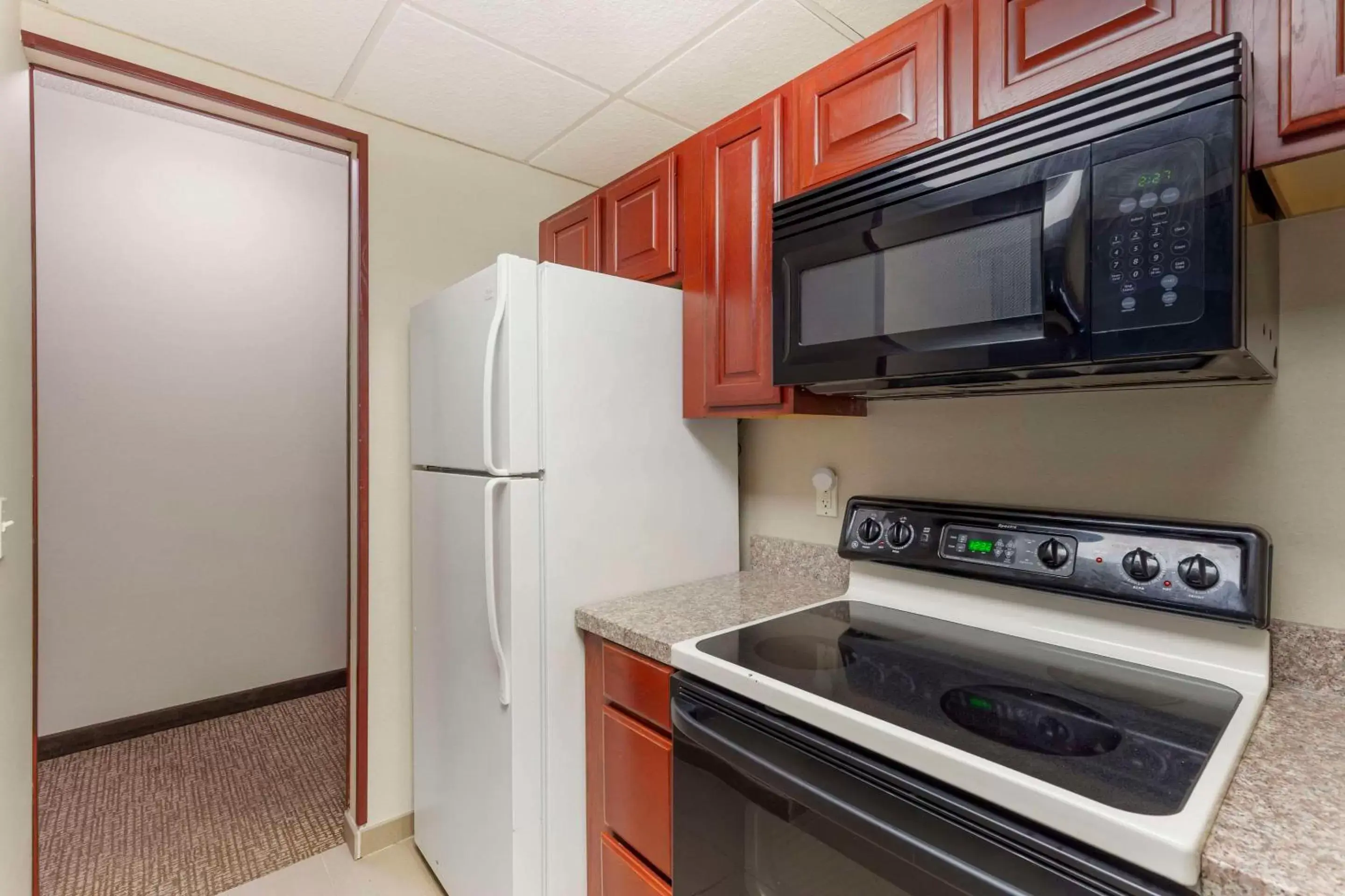 Bedroom, Kitchen/Kitchenette in Comfort Inn & Suites Rapid City