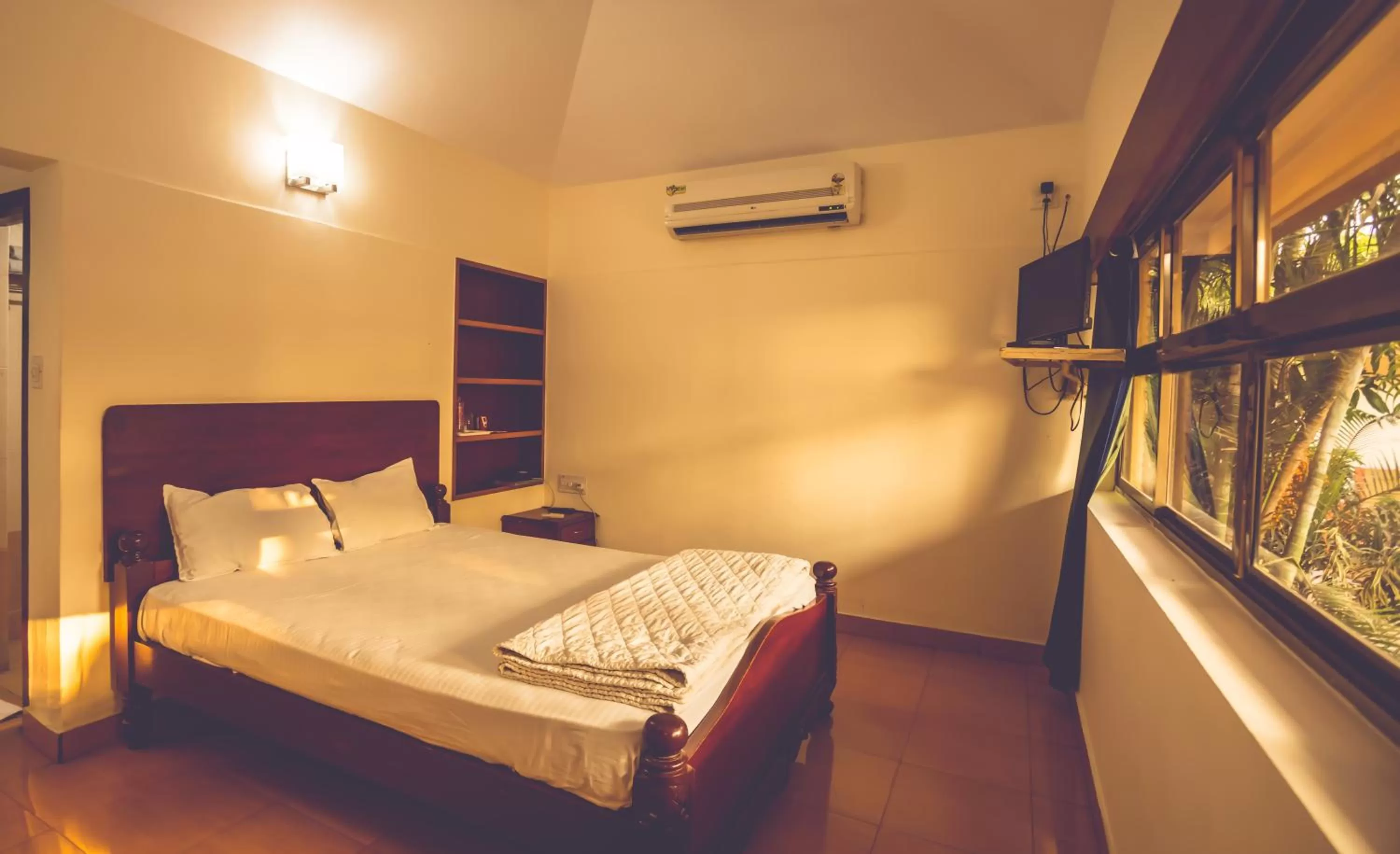 Bed in Malpe Sea Front Cottages